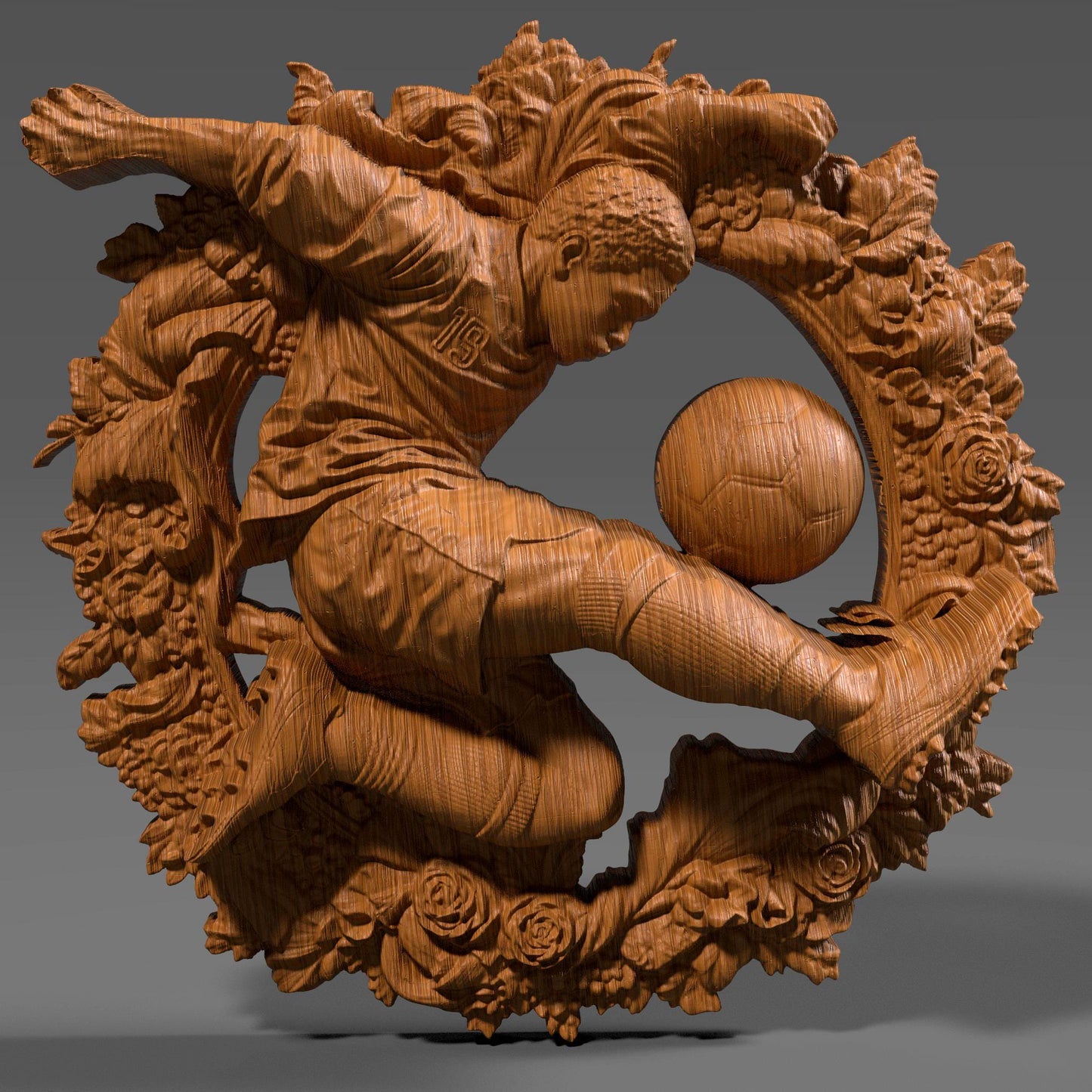 3D bas relief artwork of a dynamic male soccer player performing a powerful kick, surrounded by an ornate circular floral wreath. The athlete wears a jersey with the number 19 and is depicted mid-action with intense focus, about to strike a classic paneled soccer ball. The sculpted frame features detailed roses, leaves, and natural elements, all rendered in a carved wood finish. Ideal for CNC carving, laser engraving, or sports-themed wall decor.