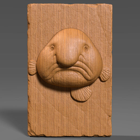 Add a touch of humor and sea-life charm to your decor with this unique Blobfish Bas Relief Wood Art. Known for its iconic frown and squishy look, the blobfish is a favorite among marine lovers and collectors of the bizarre. This 3D digital panel features finely sculpted facial folds, soft textures, and realistic anatomical detail, carved on a chipped-edge slab that enhances its handcrafted feel.