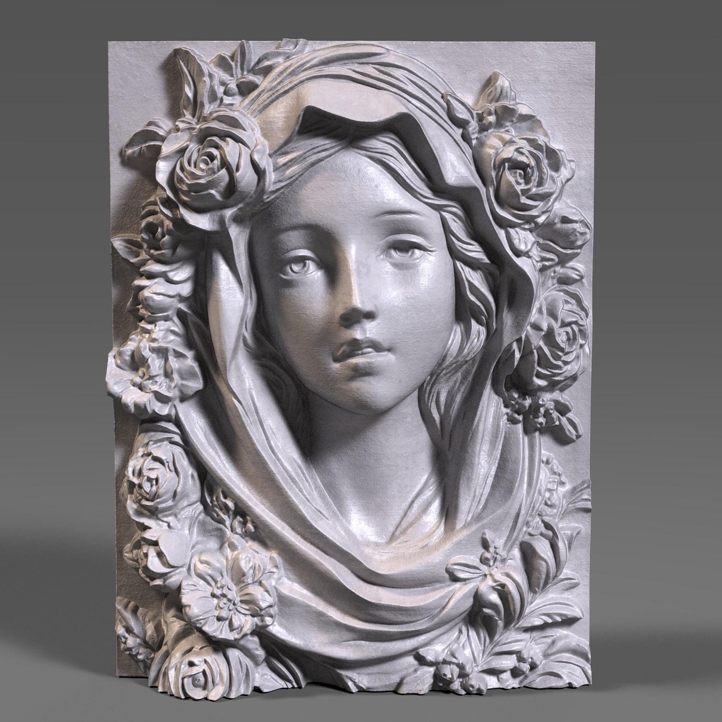 Highly detailed 3D STL model of Mother Mary’s face with a calm, spiritual expression, surrounded by carved roses and draped fabric. Designed in wood bas-relief style for CNC, laser engraving, or 3D printing. Ideal for religious wall décor or Catholic sacred art. The model features traditional iconography of the Virgin Mary with floral symbolism, ready for carving in wood, resin, or stone. STL file requires cleanup depending on machine compatibility.