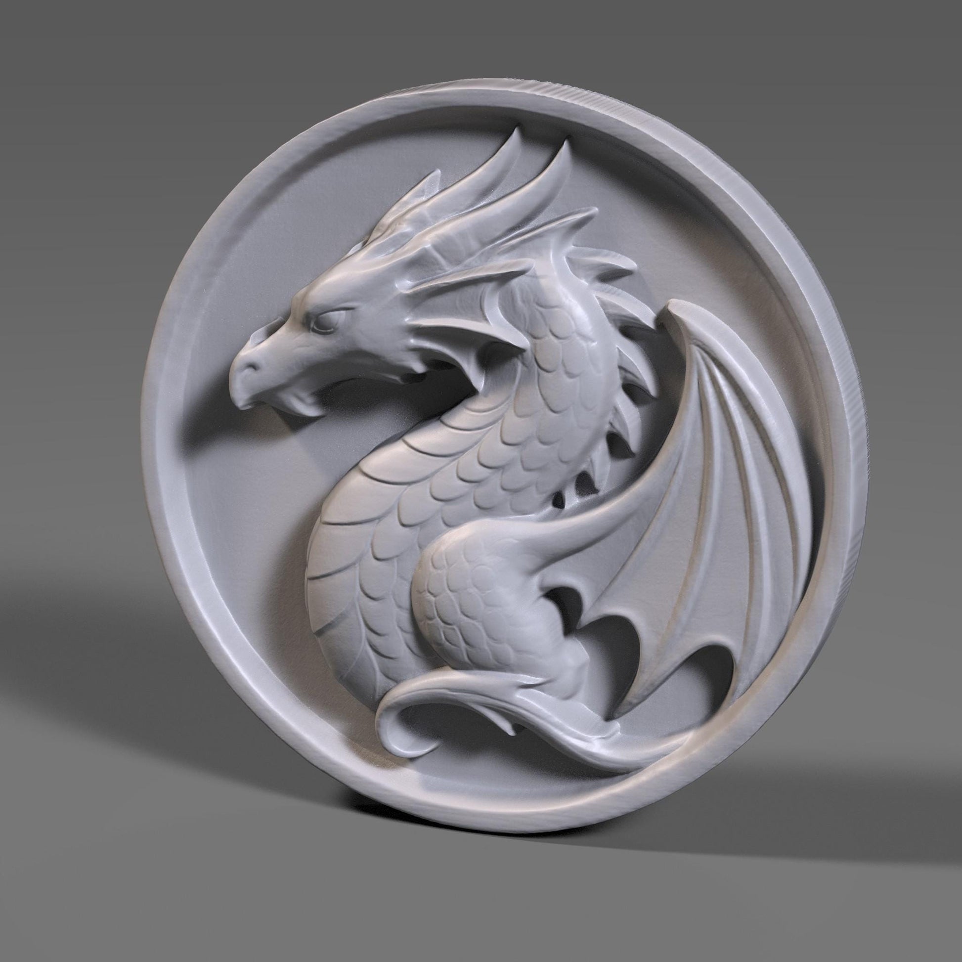 A beautifully carved bas relief of a majestic dragon on a round wooden panel. This fantasy-themed digital artwork features a curled dragon with detailed scales, horns, and wings, evoking a medieval or Viking crest style. Perfect for wall art, CNC carving, laser engraving, and fantasy décor, this high-resolution file showcases epic craftsmanship suitable for game rooms, fantasy lovers, or unique handmade gifts.