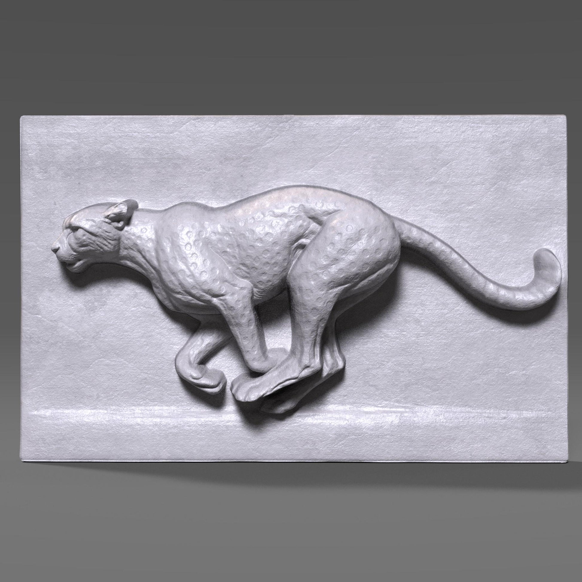 A detailed wood bas-relief sculpture of a running cheetah captured mid-stride, carved in high relief with smooth flowing anatomy and muscular definition. The cheetah is shown in a dynamic side profile against a clean rectangular wood panel, emphasizing speed, strength, and motion. The natural wood grain enhances the sculpted surface, making this wildlife-inspired artwork ideal for CNC carving, animal wall decor, and modern interior display.