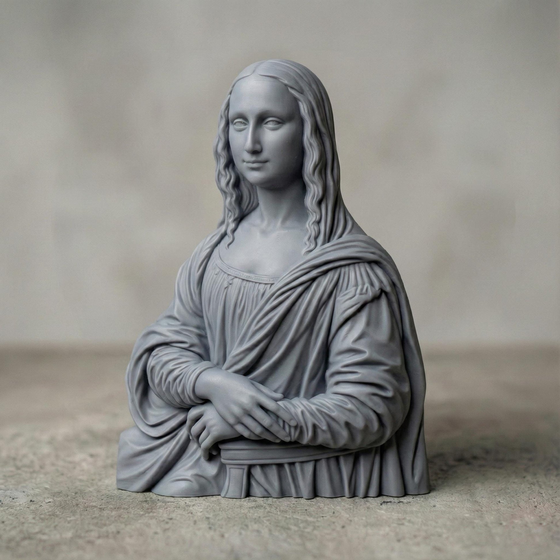 Elegant 3D sculpture of the Mona Lisa bust rendered in high-resolution resin and carved wood finishes, ideal for premium CNC carving or high-detail 3D printing. Classic Renaissance pose with flowing hair and detailed drapery, perfect for art collectors and luxury home decor creators.