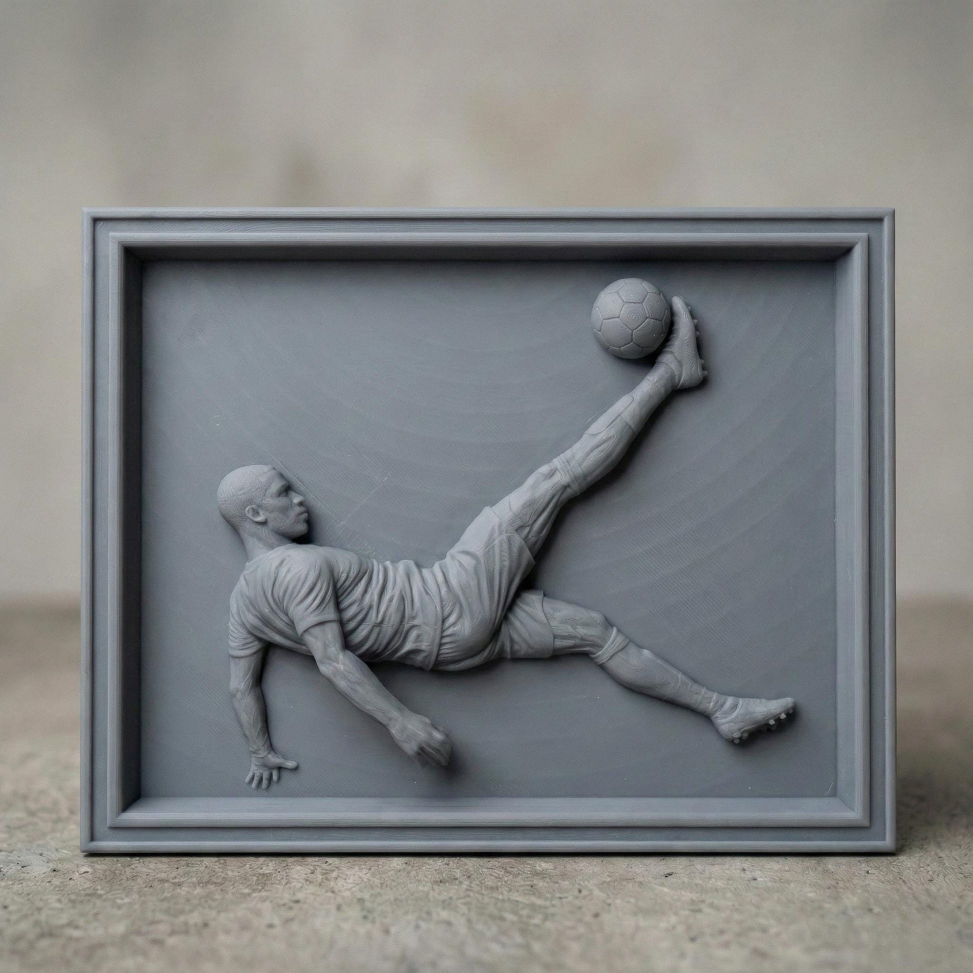 Highly detailed 3D bas-relief of a soccer player performing an overhead bicycle kick, carved in a realistic wood style. The athletic figure is captured mid-air with extended leg striking a football, showcasing dynamic motion, muscle definition, and flowing sportswear. Ideal for CNC carving, 3D printing, and wall-mounted sports decor, symbolizing passion, strength, and competitive spirit in football-inspired art.