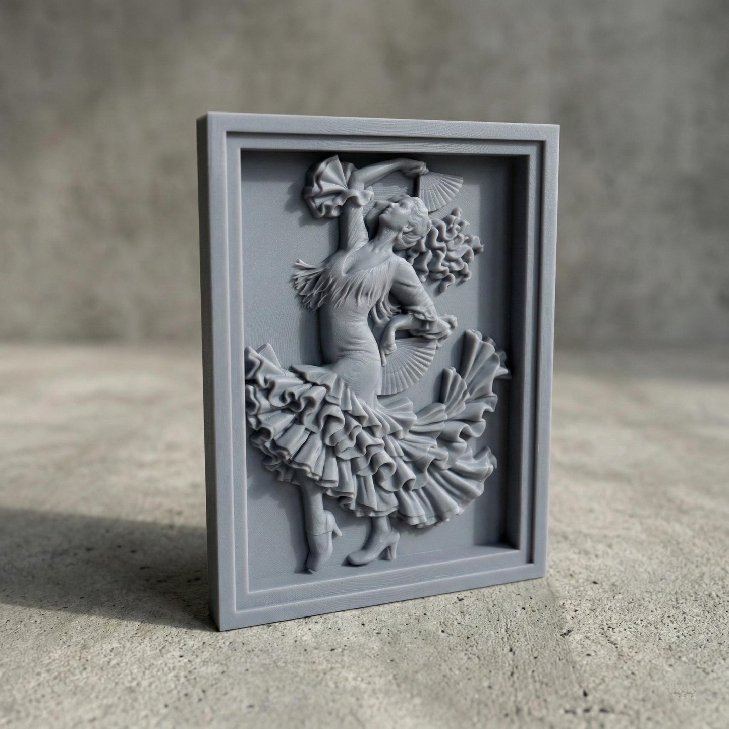 Intricately carved flamenco dancer relief showing a graceful Spanish dancer in mid-motion, holding folding fans with flowing ruffled dress and dynamic hair movement. Classical bas-relief wall art designed for CNC carving, 3D printing, or wood engraving, featuring deep shadows, elegant contours, and expressive dance posture inspired by traditional flamenco performance.