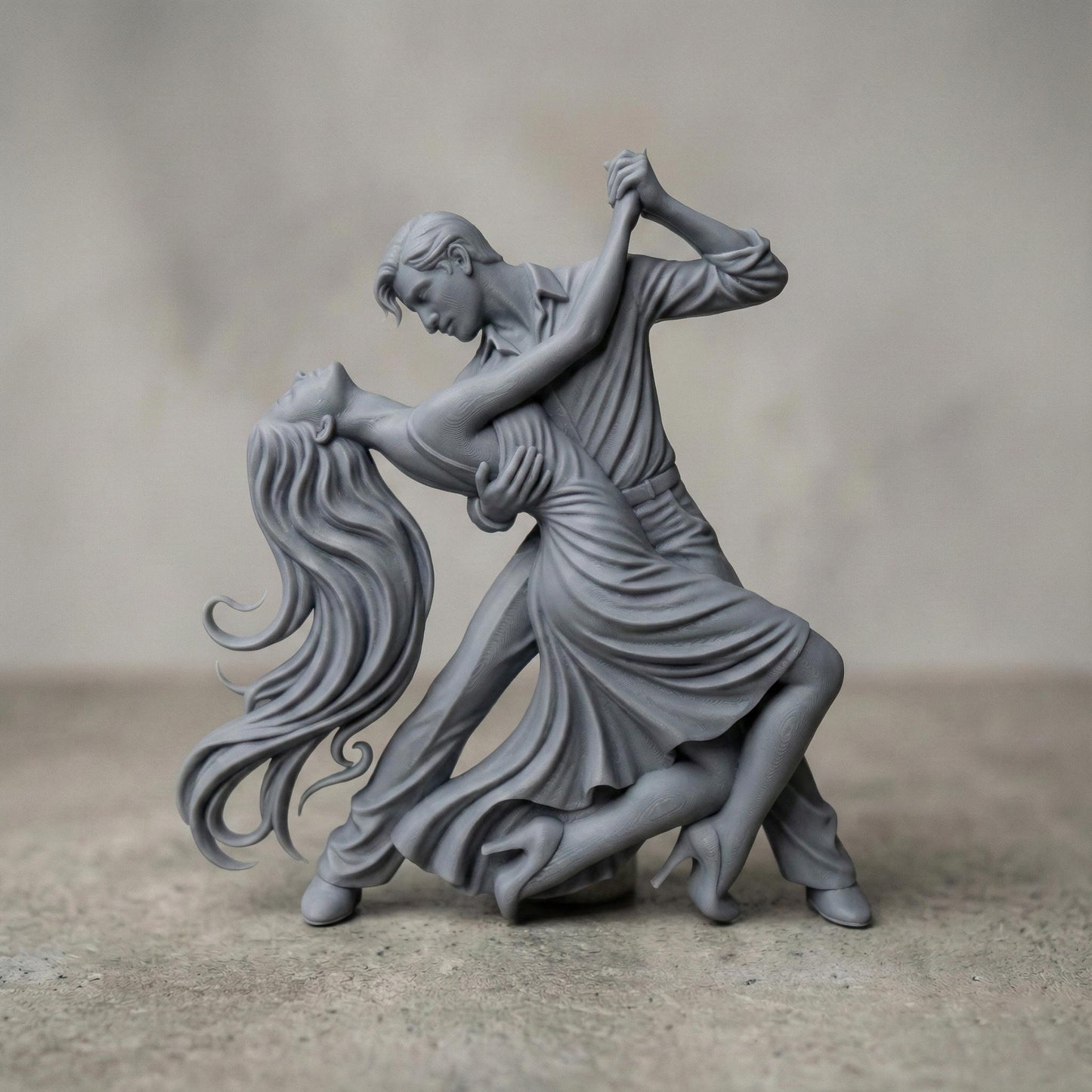 Elegant tango dance couple bas-relief depicting a passionate ballroom pose with flowing dress, intertwined movement, and expressive body language. Detailed sculpted relief designed for CNC carving, 3D printing, or wood engraving, featuring deep contours, smooth curves, and dramatic motion ideal for decorative wall art and artistic relief projects.