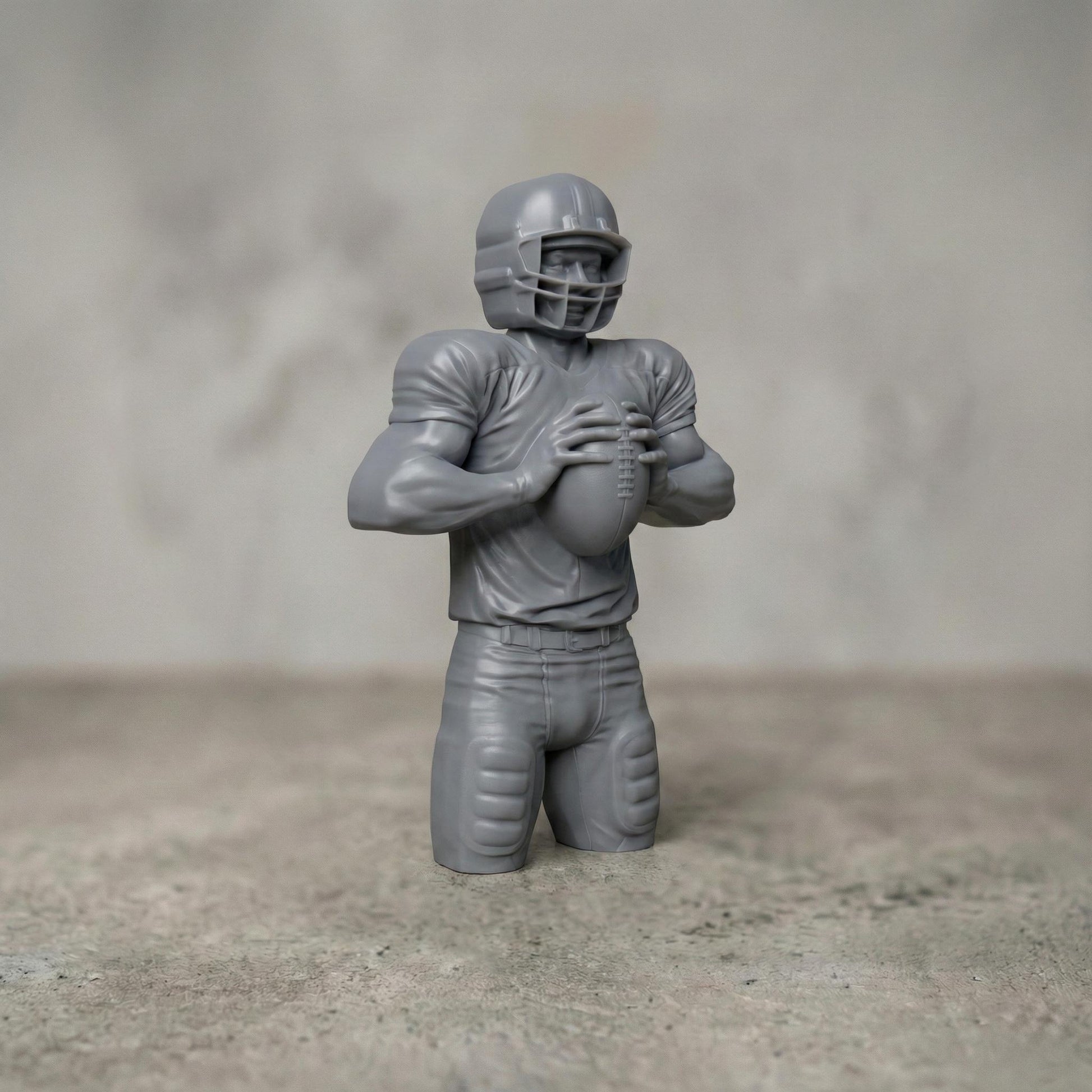 Detailed bas-relief carving of an American football player holding a ball in a ready quarterback stance, wearing a helmet and padded uniform. The design features realistic muscle definition, fabric folds, and sports gear textures carved in a wood-grain style. Ideal for CNC carving, 3D printing, or decorative sports wall art, perfect for football fans, man caves, and athletic-themed interiors.