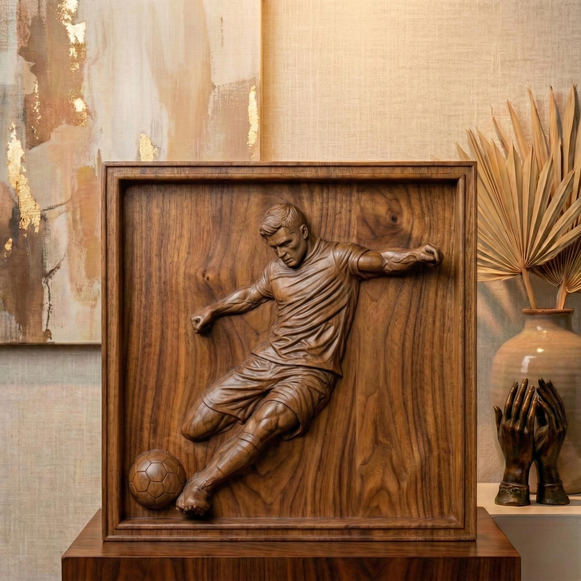 Detailed bas-relief sculpture of a soccer player captured mid-kick, shown as a realistic carved wooden relief with dynamic motion, muscular anatomy, flowing clothing folds, and a soccer ball at the foot. The design features deep relief depth, clean contours, and smooth transitions ideal for CNC carving, 3D printing, or router engraving as decorative sports wall art.