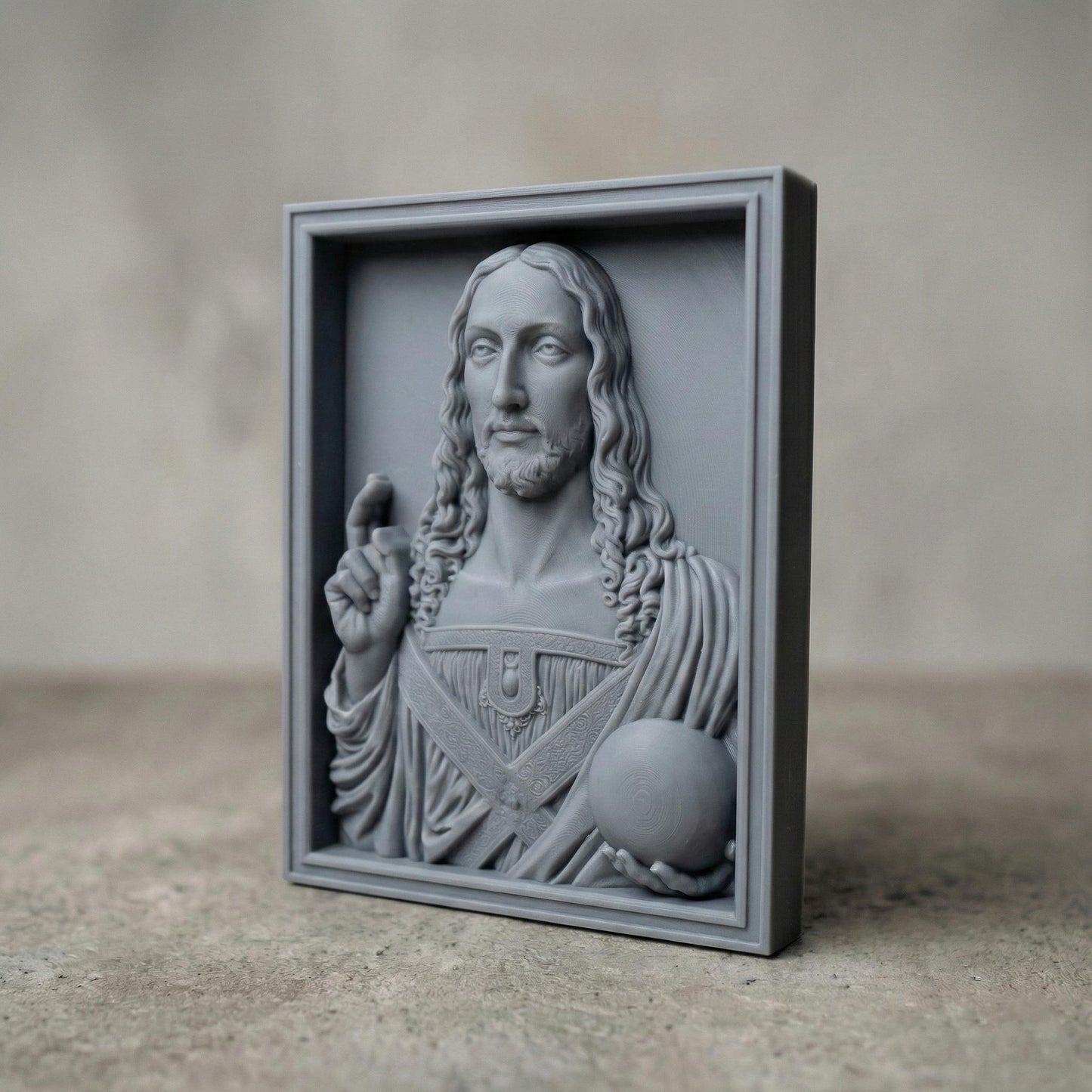 Salvator Mundi bas-relief depicting Jesus Christ holding a celestial orb and giving a blessing, inspired by Leonardo da Vinci’s iconic Renaissance masterpiece. Highly detailed sacred Christian wall art STL designed for CNC carving, wood engraving, or 3D printing, featuring classical proportions, serene expression, and refined sculptural depth for devotional and fine art projects.