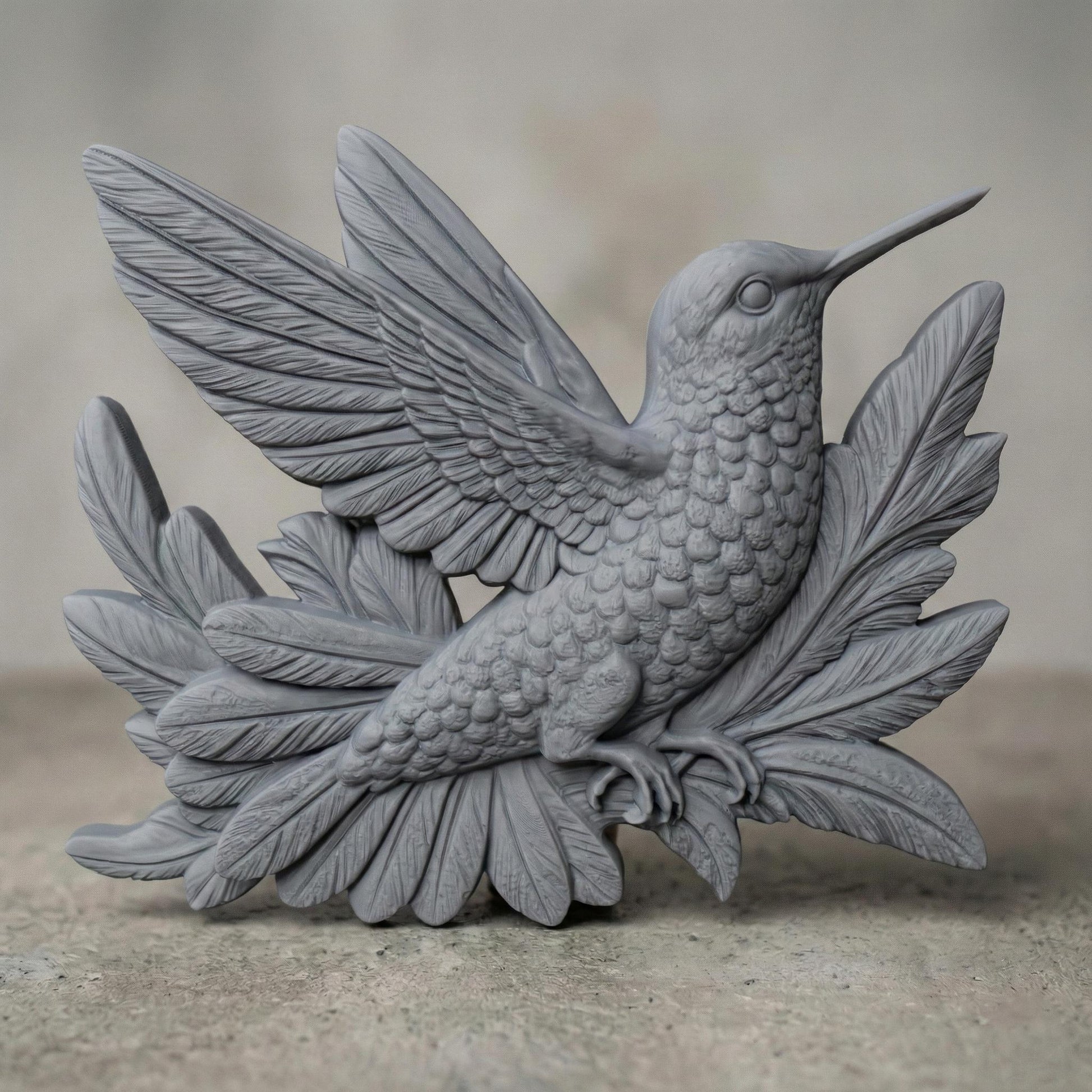 Detailed hummingbird bas relief with outstretched wings perched among layered botanical leaves, carved in a realistic wood-grain style. The bird features finely textured feathers, a long pointed beak, and natural flowing contours. The sculptural design evokes nature, tranquility, and handcrafted elegance, ideal for CNC carving, 3D printing, or decorative wall art panels.