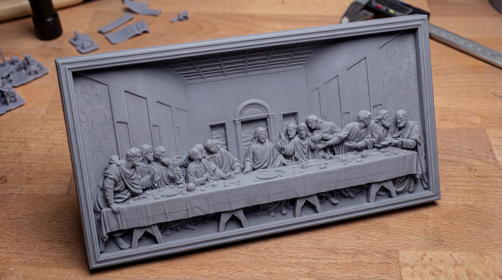 Highly detailed bas-relief depiction of the Last Supper featuring Jesus Christ seated at the center with the twelve apostles gathered around a long dining table inside a classical interior setting. The scene shows expressive gestures, flowing robes, textured walls, and architectural depth. Designed as a framed rectangular relief panel suitable for CNC carving, 3D printing, and church or home devotional wall décor.