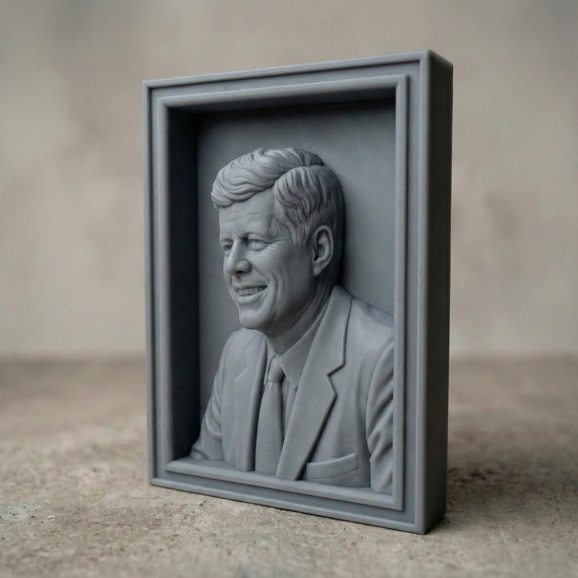 Detailed bas-relief portrait of a smiling mid-century president in a suit and tie, carved in rich wood texture with flowing hair strands, expressive eyes, and realistic facial contours. Displayed as both a freestanding bust on a workbench with carving tools and as a framed wall relief panel, evoking patriotism, leadership, and historic American legacy in a classic handcrafted style.