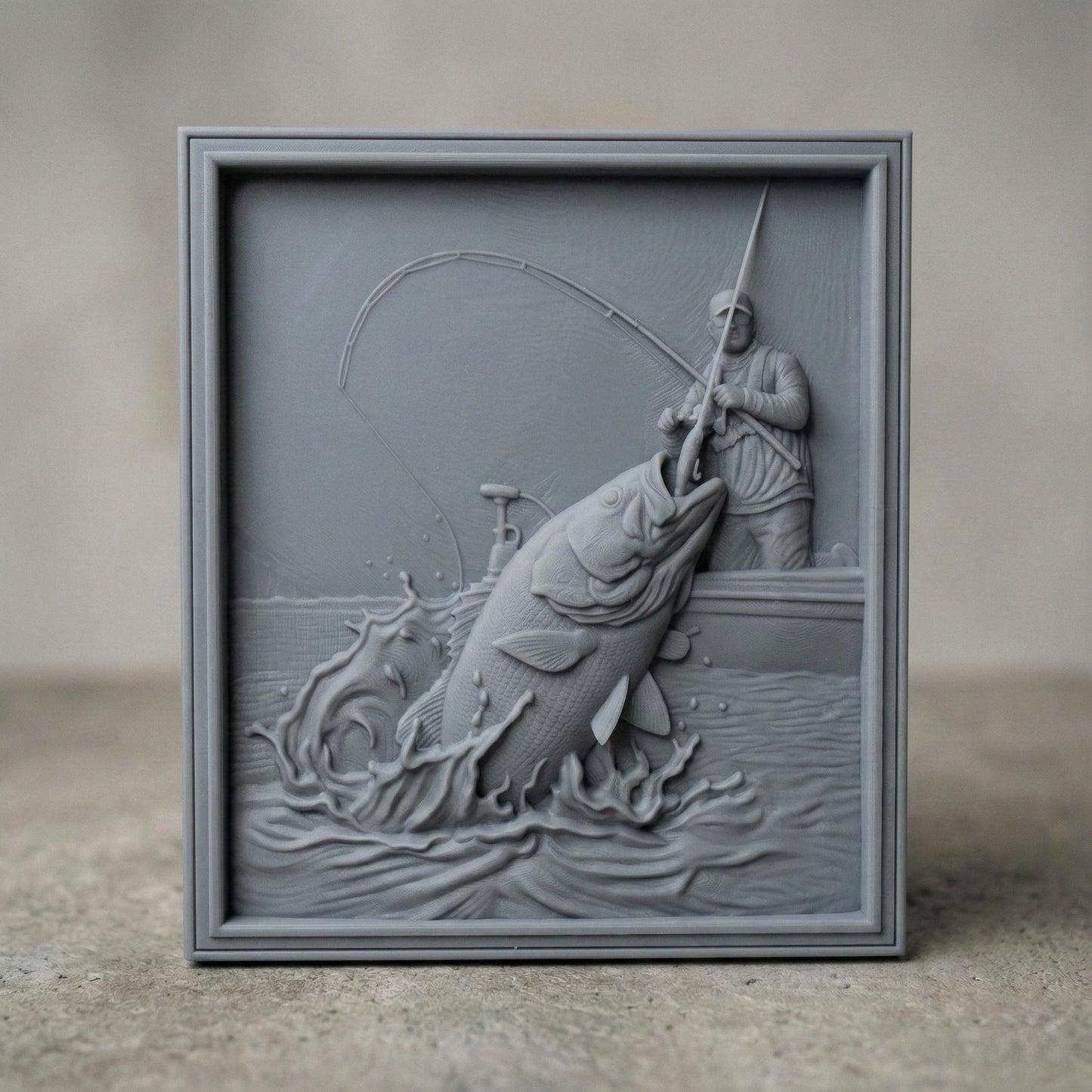 High-detail bas-relief carving of a fisherman standing in a boat, reeling in a massive jumping bass as water splashes dramatically around it. The scene features a bent fishing rod, textured fish scales, rippling waves, and dynamic motion captured in layered depth. Shown as both a rich wood-style carved panel and a smooth gray 3D print relief, framed as a striking rustic fishing lodge wall décor piece.