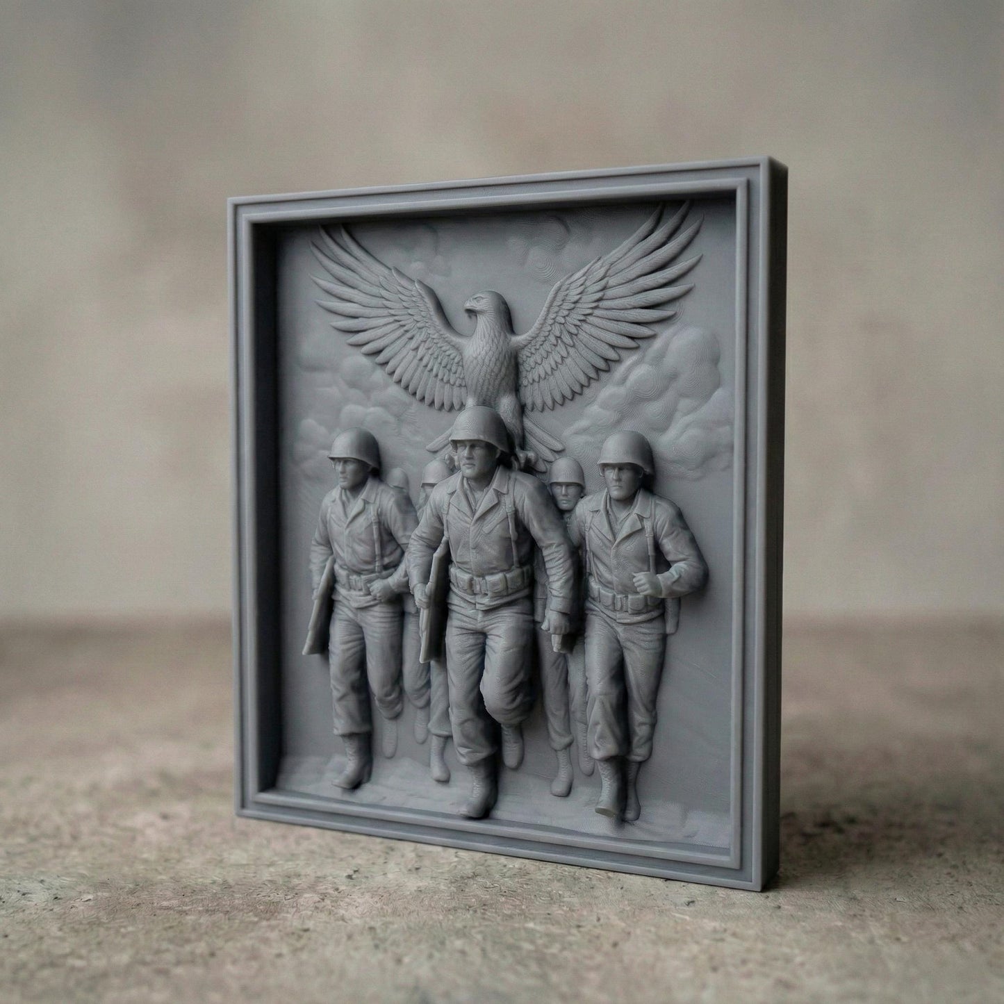 Detailed bas-relief carving of five marching soldiers in uniform advancing forward with rifles in hand, symbolizing unity and bravery. Above them, a large eagle spreads its wings wide in a protective and patriotic gesture. The framed composition emphasizes strength, sacrifice, and honor. Designed as a high-depth relief panel for CNC carving or 3D printing, ideal for military tribute wall art and veteran memorial décor.