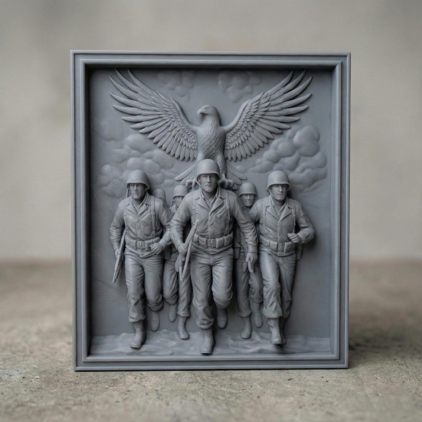 Detailed bas-relief carving of five marching soldiers in uniform advancing forward with rifles in hand, symbolizing unity and bravery. Above them, a large eagle spreads its wings wide in a protective and patriotic gesture. The framed composition emphasizes strength, sacrifice, and honor. Designed as a high-depth relief panel for CNC carving or 3D printing, ideal for military tribute wall art and veteran memorial décor.