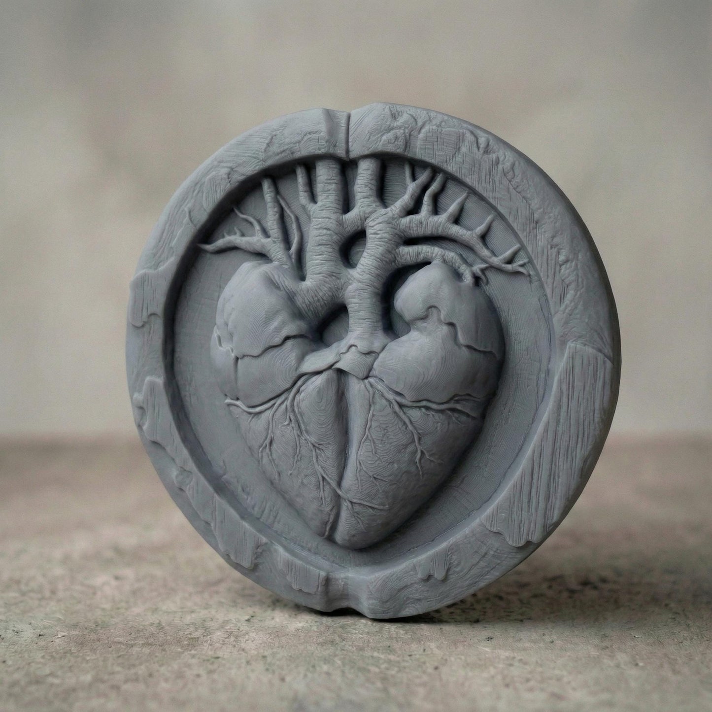 Round bas-relief wood carving of an anatomical human heart seamlessly merging with tree branches and roots, symbolizing life and love. The heart’s arteries extend upward like a tree of life canopy, while veins form organic roots below. Encased in a circular frame with natural wood texture and deep relief detail, this sculptural design evokes romance, vitality, and sacred connection, ideal for CNC carving or 3D printed wall decor.