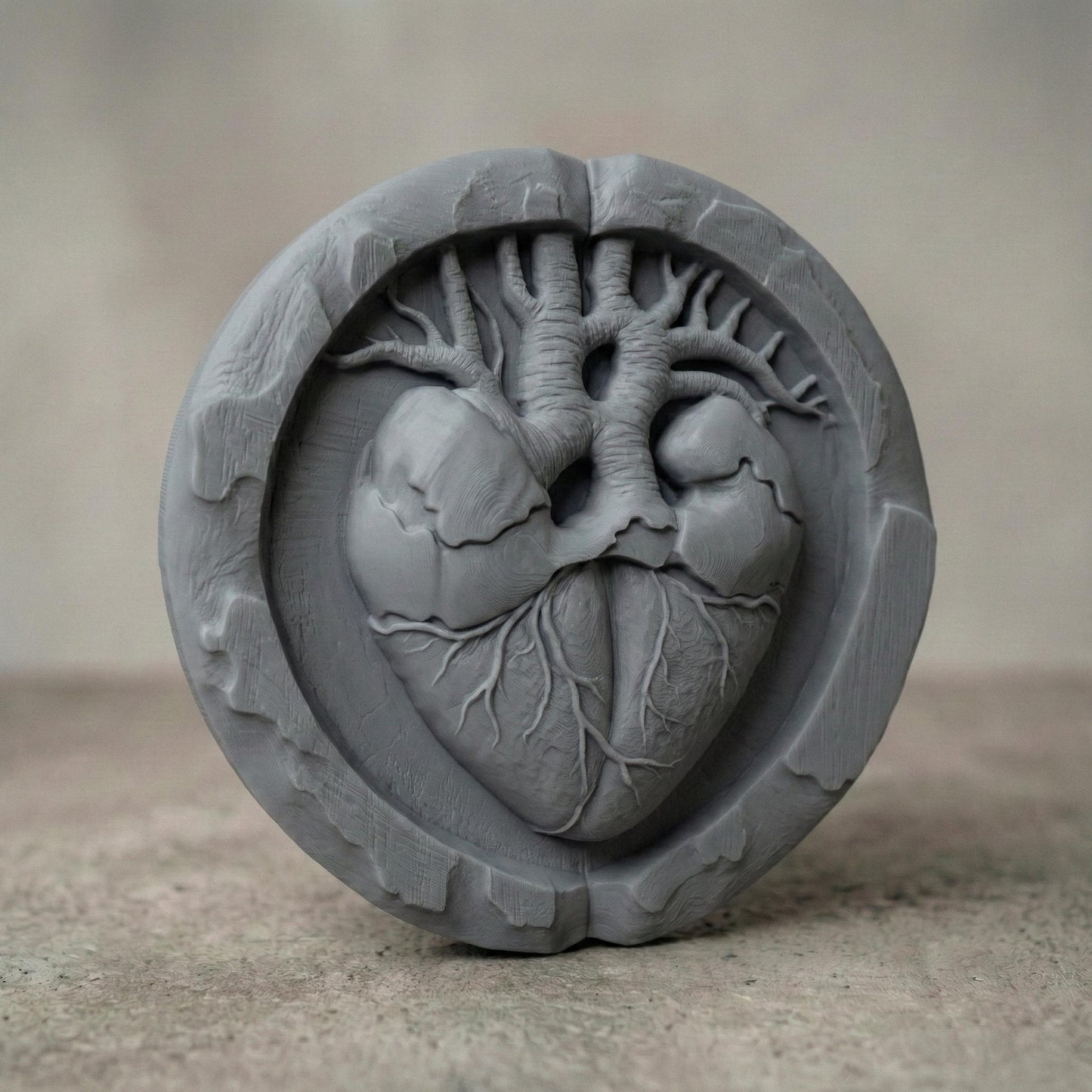 Round bas-relief wood carving of an anatomical human heart seamlessly merging with tree branches and roots, symbolizing life and love. The heart’s arteries extend upward like a tree of life canopy, while veins form organic roots below. Encased in a circular frame with natural wood texture and deep relief detail, this sculptural design evokes romance, vitality, and sacred connection, ideal for CNC carving or 3D printed wall decor.