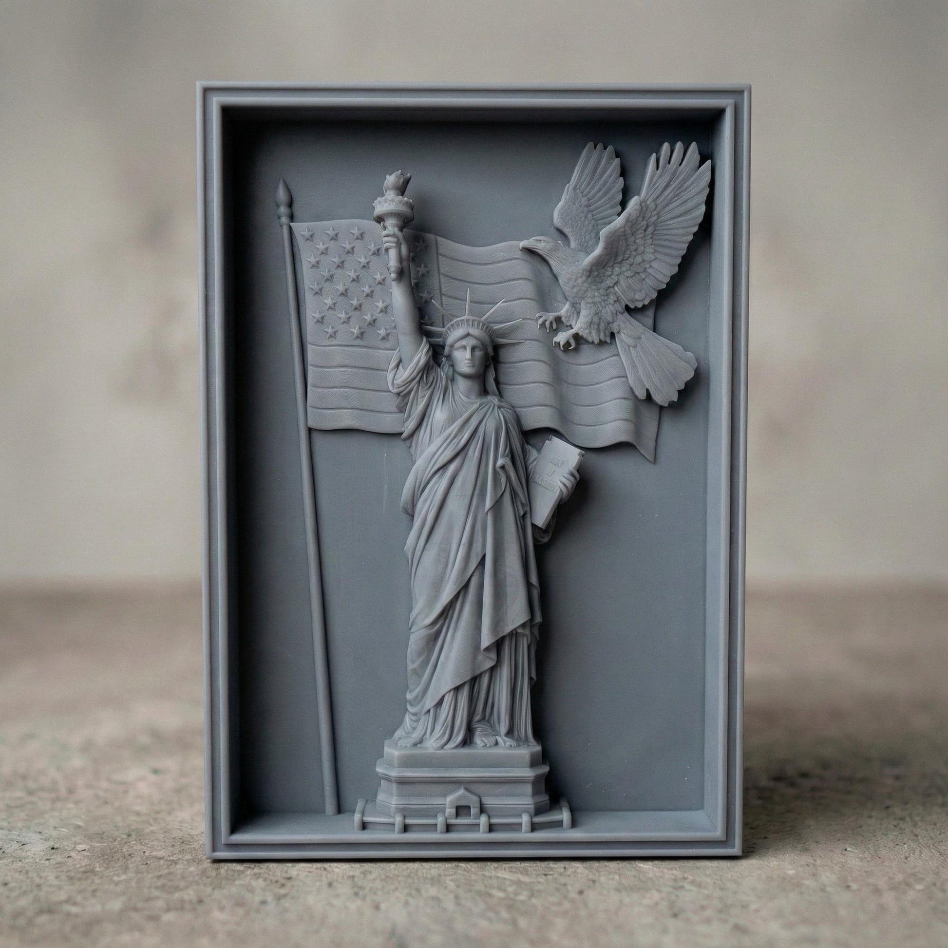 A detailed 3D bas-relief design featuring the Statue of Liberty holding a torch and a book, with a bald eagle soaring across a flowing American flag. This powerful vertical artwork celebrates Independence Day (United States) and is perfect for CNC carving, laser engraving, or 3D printing on wood, resin, or stone. Ideal for July 4th patriotic displays, American-themed home decor, and gifting. A striking tribute to freedom, liberty, and national pride.
