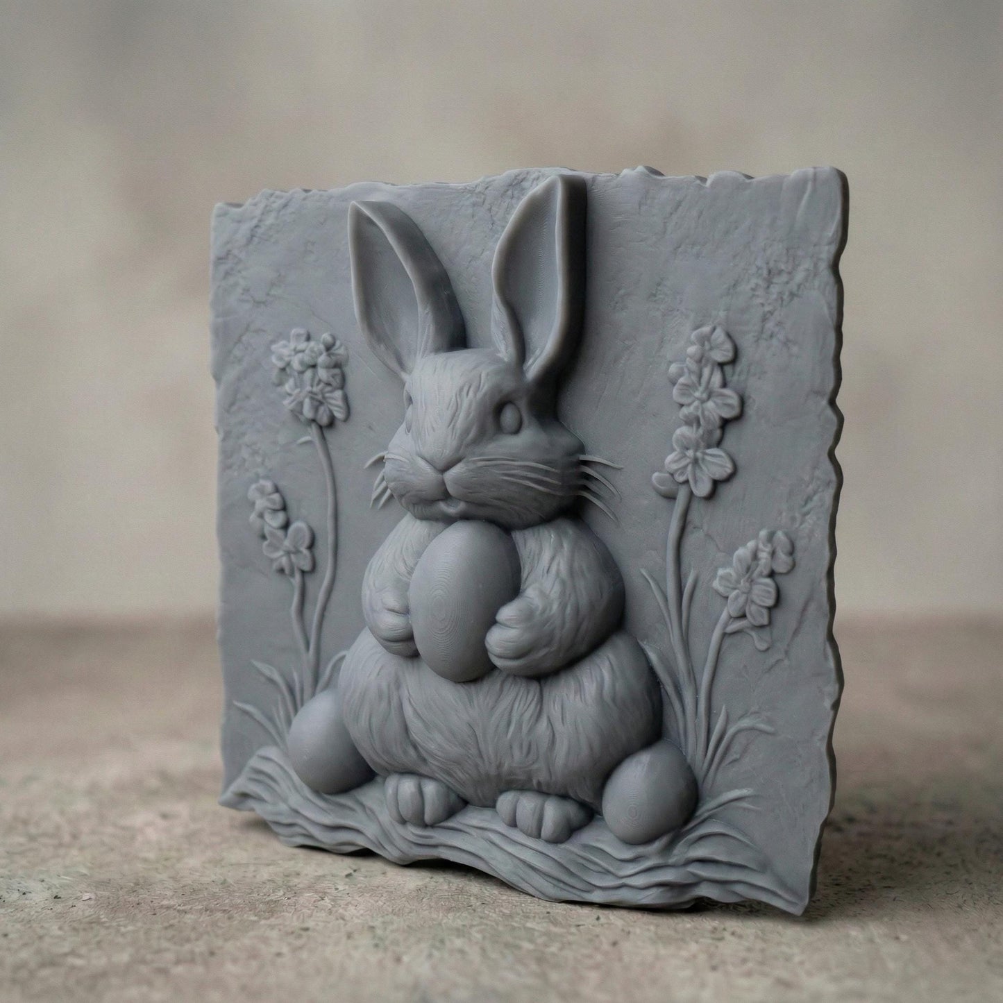 Rustic bas-relief carving of a cute Easter bunny holding a large egg, surrounded by simple wildflowers and grass. The design features a natural live-edge wood style background with organic texture and soft carved details. The bunny has rounded features and a gentle expression, making it perfect for spring and Easter wall decor designed for CNC carving or 3D printing.