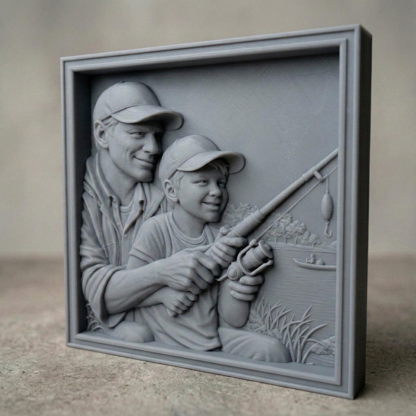 Bas relief carving of a father and young son sitting by a peaceful lake in spring, both wearing caps and smiling as they hold a fishing rod together. The father gently guides the child’s hands while casting toward calm water with a small boat in the distance. Framed square composition with detailed facial features, textured clothing, fresh grass, and serene springtime scenery, symbolizing bonding and outdoor family moments.