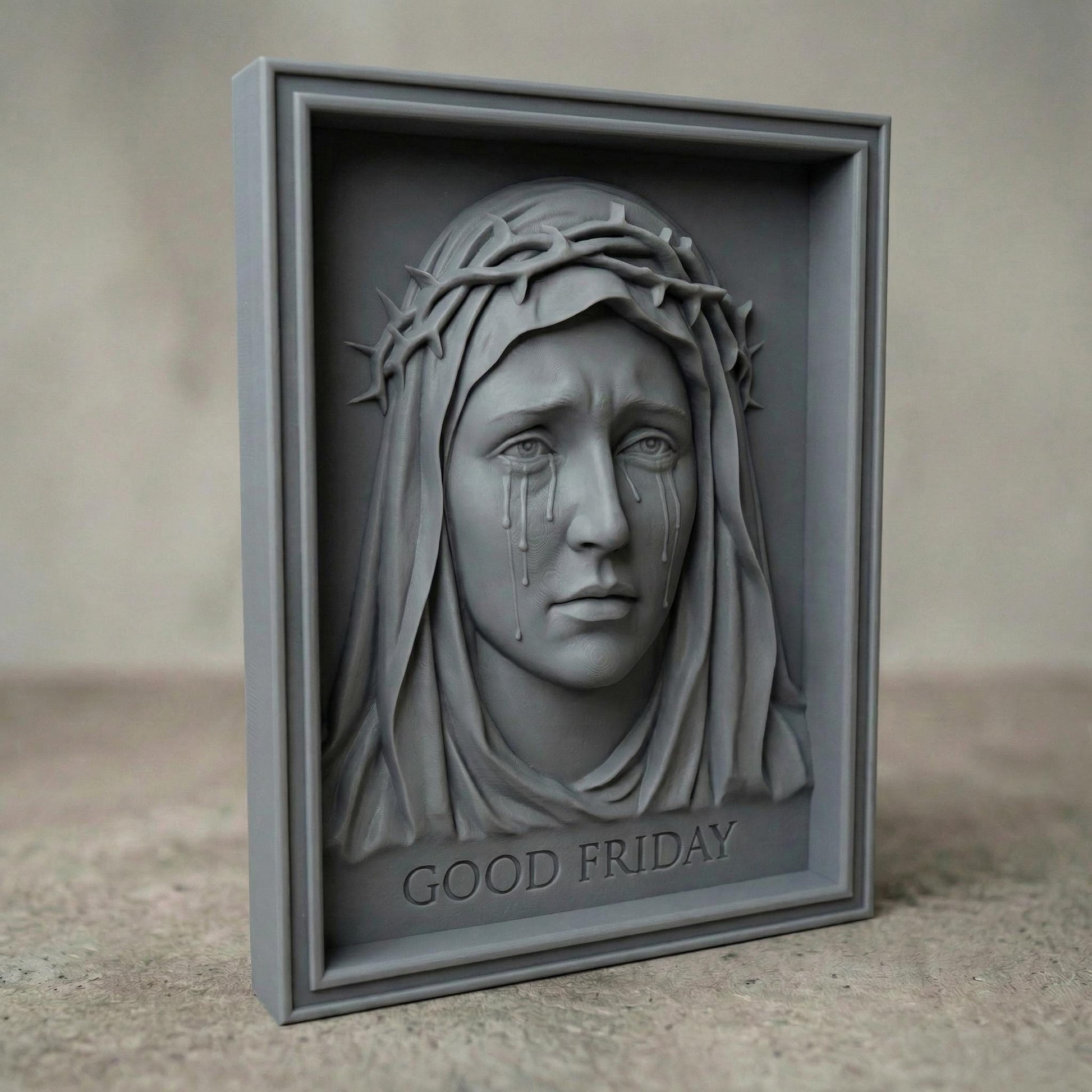 High-relief 3D bas-relief of the Virgin Mary with a sorrowful expression, tears flowing down her face, wearing a crown of thorns and a draped veil. The framed composition includes the inscription “Good Friday” beneath the portrait. Detailed facial features, textured wood grain surface, and deep carving layers create a powerful Christian devotional wall art design for CNC carving and 3D printing.