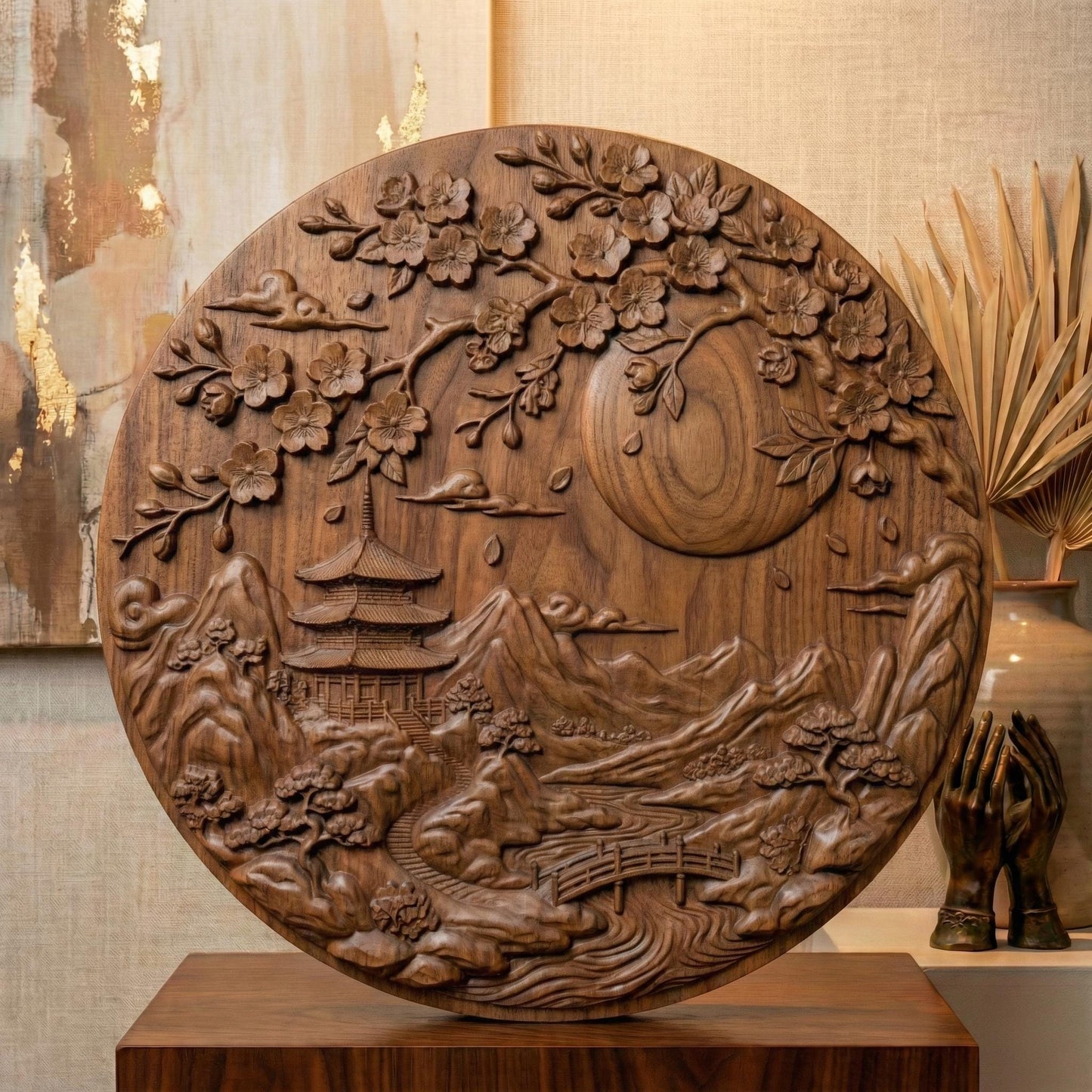 Intricate round bas-relief featuring a serene Japanese landscape with tiered pagoda temple, flowing river, arched wooden bridge, layered mountain peaks, and drifting clouds beneath a large full moon. Cherry blossom branches frame the top with detailed petals and falling leaves. Deep carving and textured contours create dimensional shadows, ideal for CNC carving, 3D printing, and tranquil Zen-inspired wall décor.