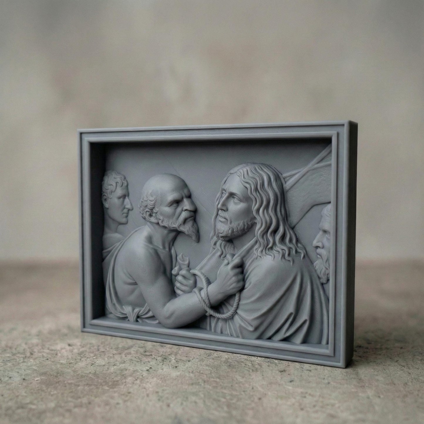 Detailed bas relief sculpture depicting Jesus standing before Pilate, surrounded by Roman figures, with a solemn expression and bound hands symbolizing sacrifice and judgment. The scene features flowing robes, textured hair, and expressive faces carved in high relief within a framed panel. Designed for CNC carving and 3D printing, this Christian Passion artwork evokes Holy Week devotion, faith, and biblical storytelling in elegant classical style.