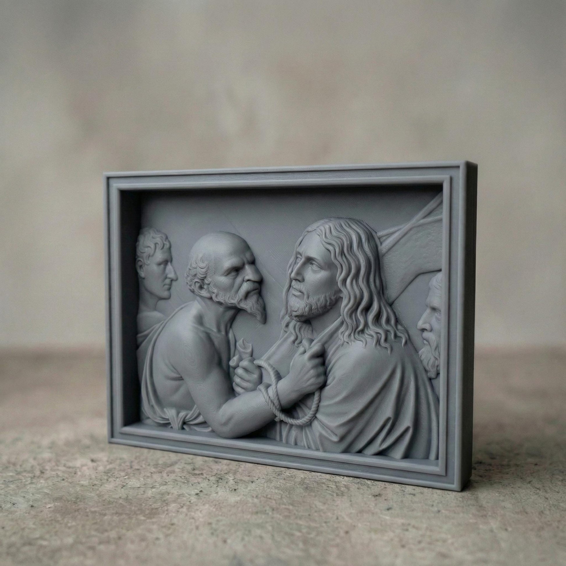 Detailed bas relief sculpture depicting Jesus standing before Pilate, surrounded by Roman figures, with a solemn expression and bound hands symbolizing sacrifice and judgment. The scene features flowing robes, textured hair, and expressive faces carved in high relief within a framed panel. Designed for CNC carving and 3D printing, this Christian Passion artwork evokes Holy Week devotion, faith, and biblical storytelling in elegant classical style.