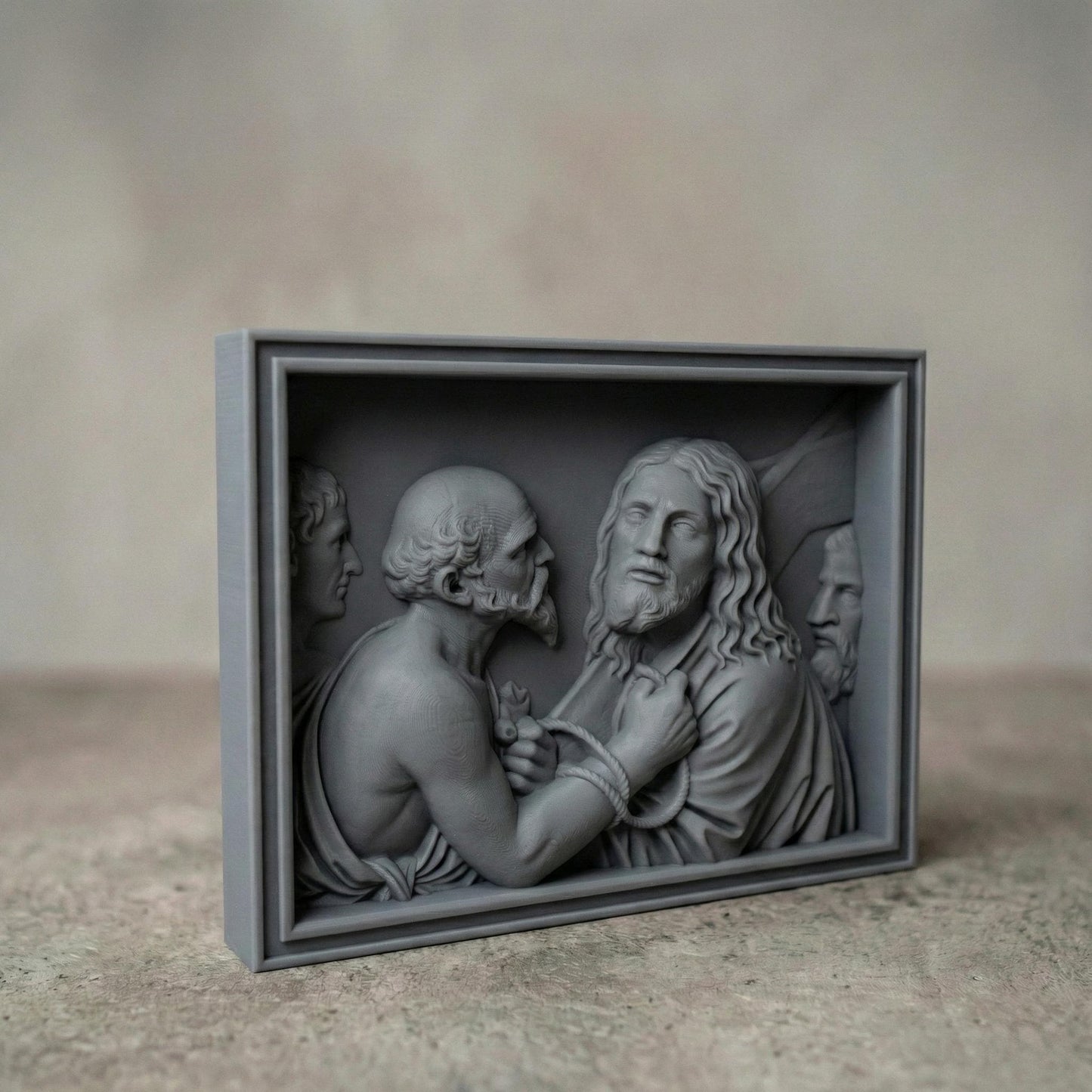 Detailed bas relief sculpture depicting Jesus standing before Pilate, surrounded by Roman figures, with a solemn expression and bound hands symbolizing sacrifice and judgment. The scene features flowing robes, textured hair, and expressive faces carved in high relief within a framed panel. Designed for CNC carving and 3D printing, this Christian Passion artwork evokes Holy Week devotion, faith, and biblical storytelling in elegant classical style.