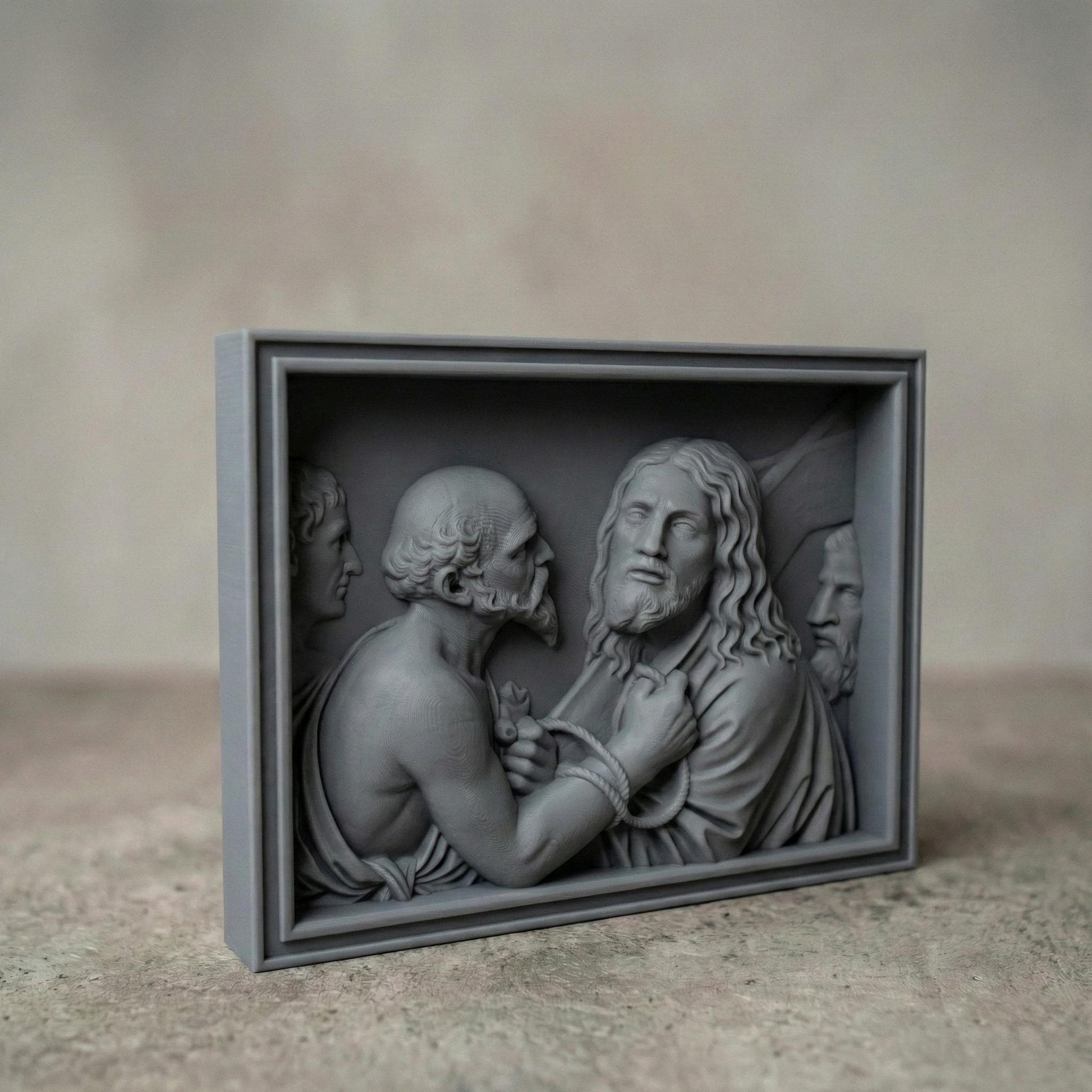 Detailed bas relief sculpture depicting Jesus standing before Pilate, surrounded by Roman figures, with a solemn expression and bound hands symbolizing sacrifice and judgment. The scene features flowing robes, textured hair, and expressive faces carved in high relief within a framed panel. Designed for CNC carving and 3D printing, this Christian Passion artwork evokes Holy Week devotion, faith, and biblical storytelling in elegant classical style.