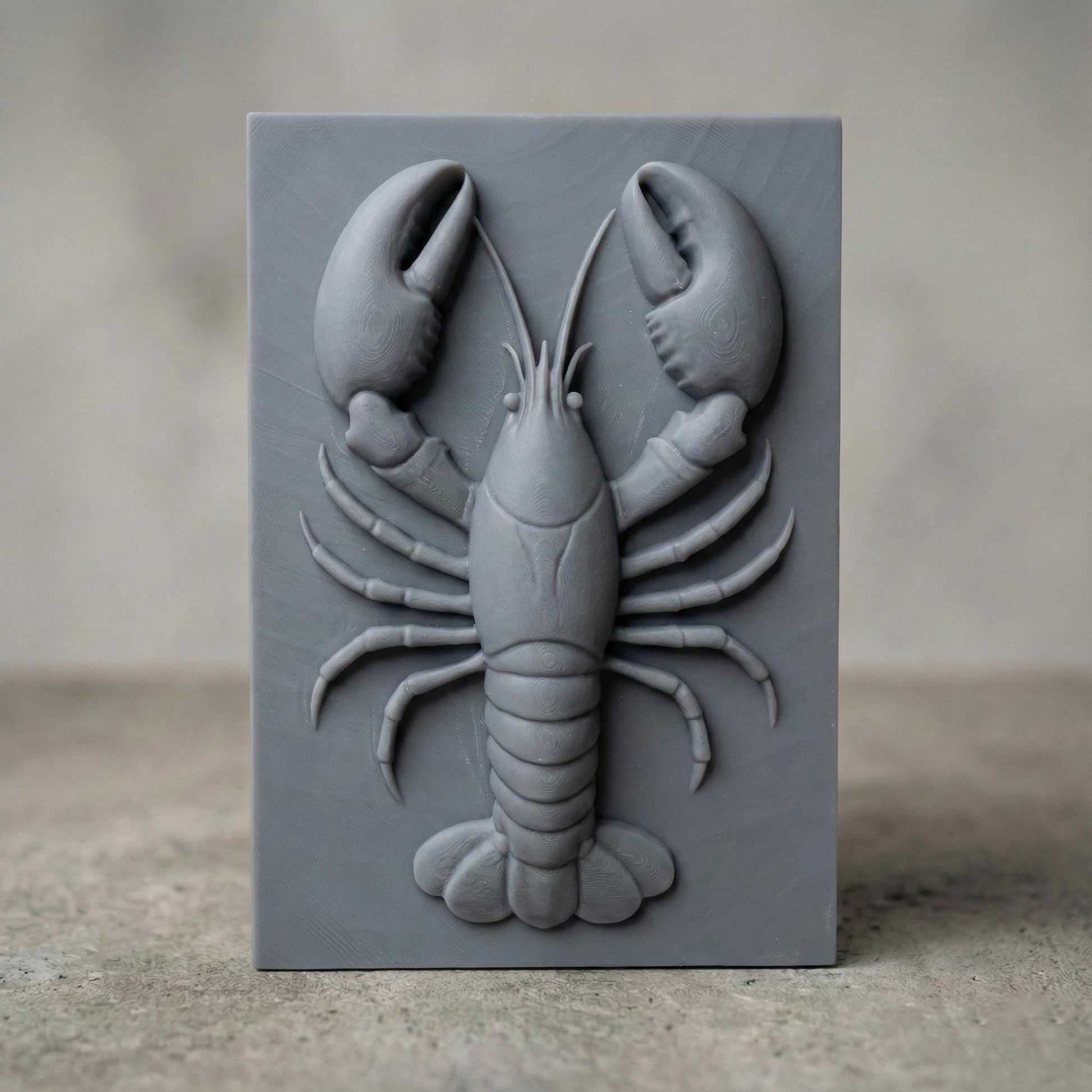 Bring the charm of the sea to your space with this stunning 3D Lobster Bas Relief Wood Art. This digital design captures the intricate form of a lobster in high detail, from its segmented claws to delicate legs, perfect for marine and coastal-themed interiors. Ideal for CNC carving or laser engraving, the panel includes subtle wood grain detail and chipped-edge slab aesthetics for a handcrafted, rustic feel. A perfect fit for beach homes, seafood restaurants, or nautical gift lovers.