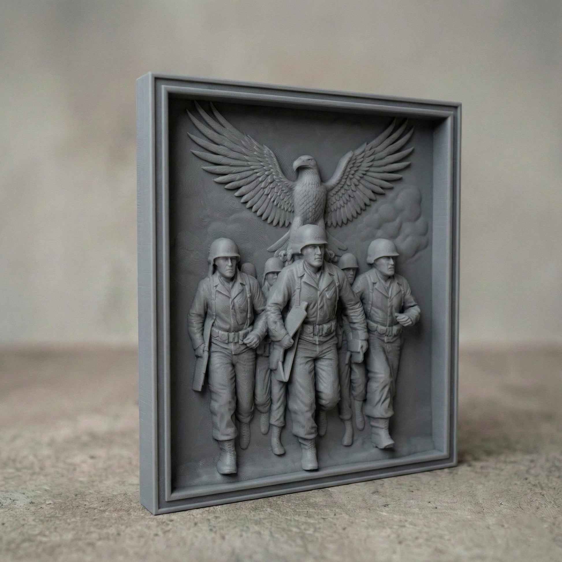 Detailed bas-relief carving of five marching soldiers in uniform advancing forward with rifles in hand, symbolizing unity and bravery. Above them, a large eagle spreads its wings wide in a protective and patriotic gesture. The framed composition emphasizes strength, sacrifice, and honor. Designed as a high-depth relief panel for CNC carving or 3D printing, ideal for military tribute wall art and veteran memorial décor.