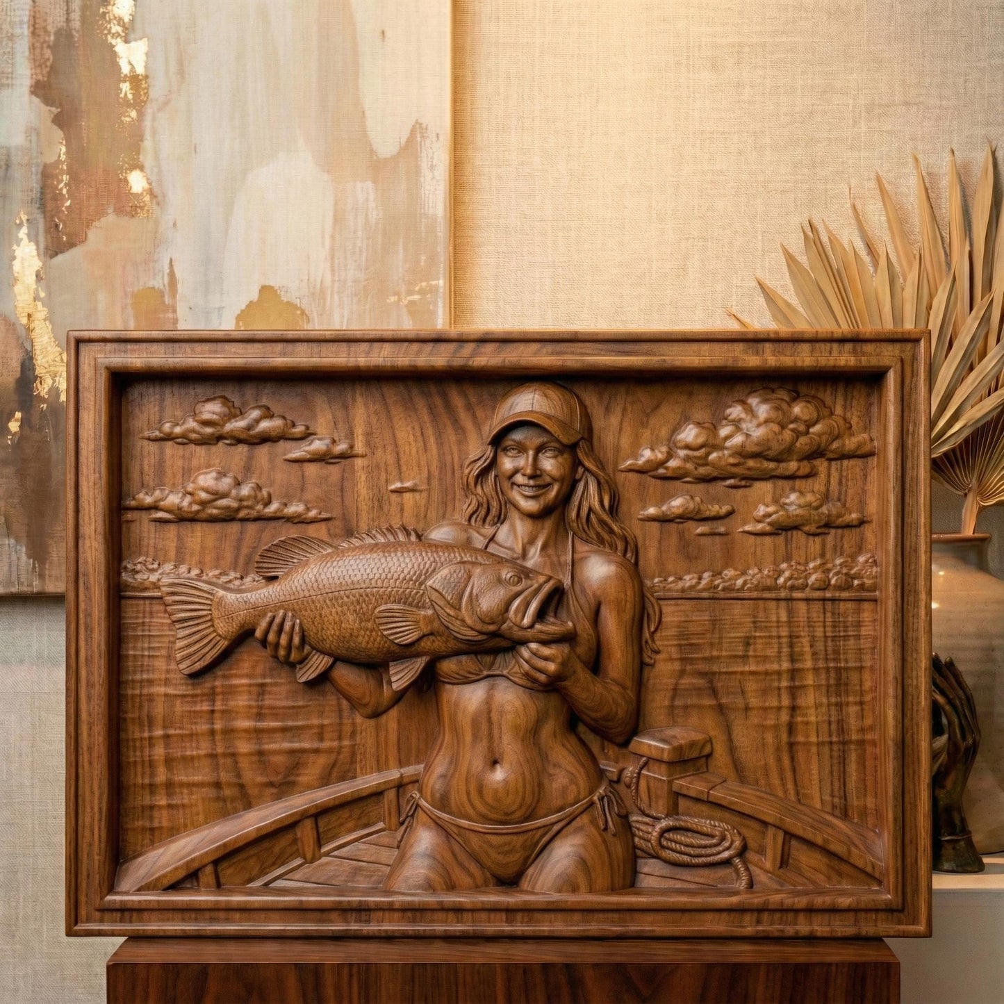 Detailed bas-relief carving of a smiling female angler holding a large bass fish while standing on a boat. The scene features calm lake water, carved clouds in the sky, and realistic wood grain texture. The rectangular framed panel highlights fine details in the fish scales, facial expression, and boat elements, designed for CNC carving or 3D printing as rustic fishing wall decor.
