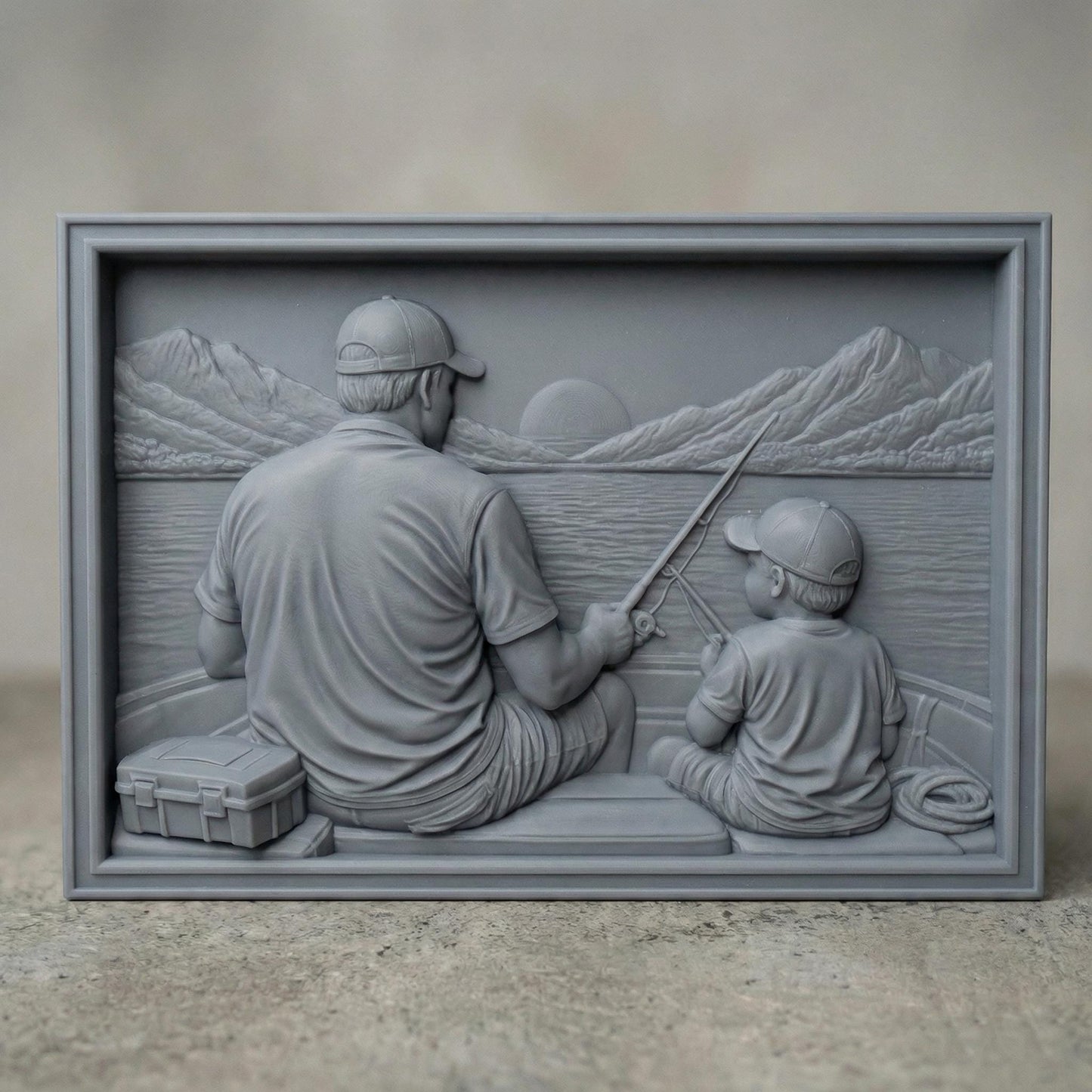 Bas relief carving of a father and young son sitting by a peaceful lake in spring, both wearing caps and smiling as they hold a fishing rod together. The father gently guides the child’s hands while casting toward calm water with a small boat in the distance. Framed square composition with detailed facial features, textured clothing, fresh grass, and serene springtime scenery, symbolizing bonding and outdoor family moments.