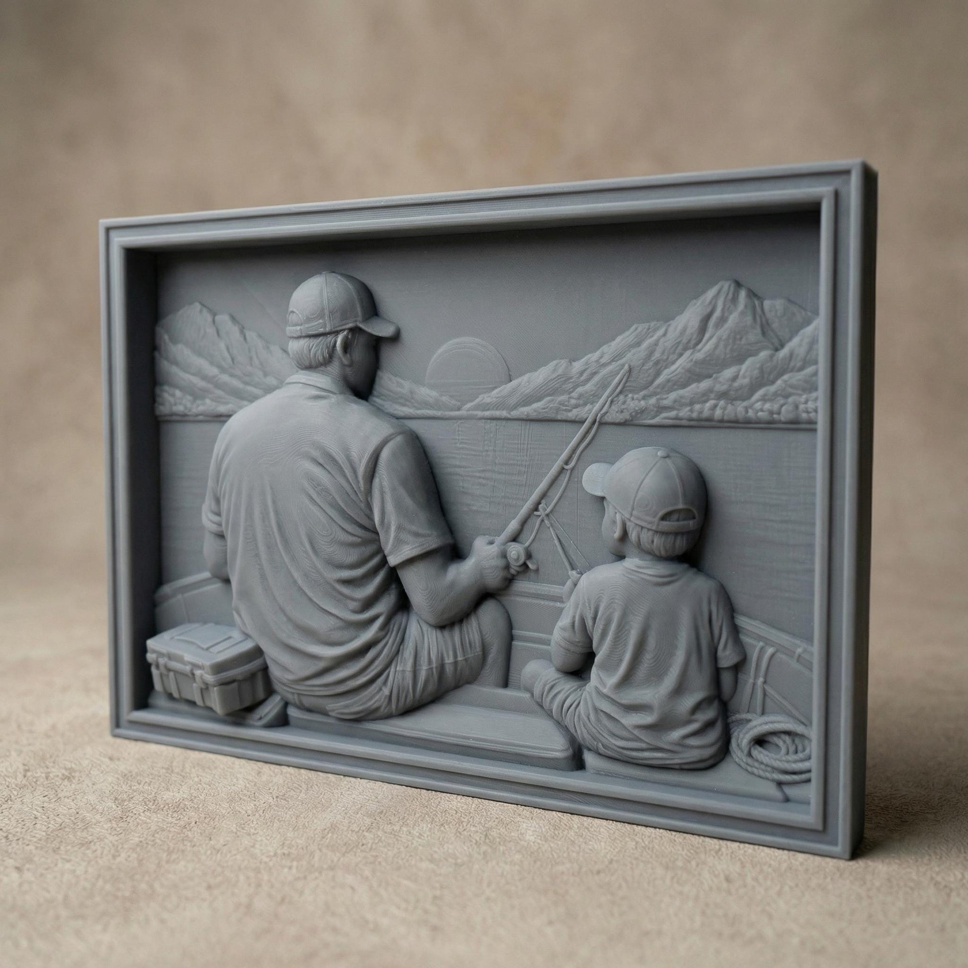 Bas relief carving of a father and young son sitting by a peaceful lake in spring, both wearing caps and smiling as they hold a fishing rod together. The father gently guides the child’s hands while casting toward calm water with a small boat in the distance. Framed square composition with detailed facial features, textured clothing, fresh grass, and serene springtime scenery, symbolizing bonding and outdoor family moments.