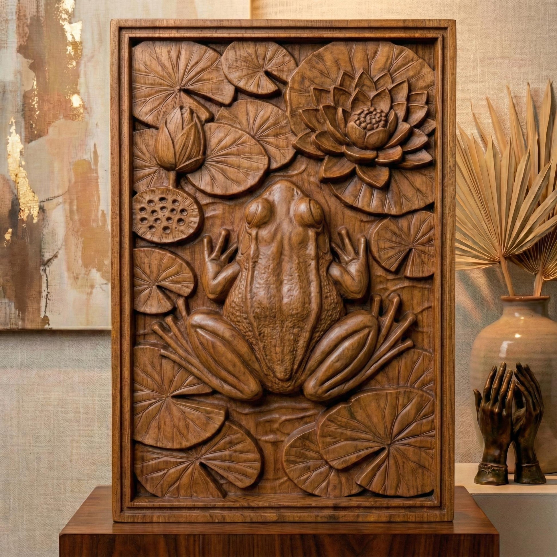 Detailed bas-relief panel showing a realistic frog resting among layered lily pads and a blooming lotus flower, symbolizing spring renewal and natural harmony. The composition features textured leaves, lotus seed pod, and overlapping circular pads creating rich depth and shadow. The frog’s sculpted back and limbs add lifelike dimension, ideal for CNC carving, 3D printing, and spring-inspired botanical wall décor.