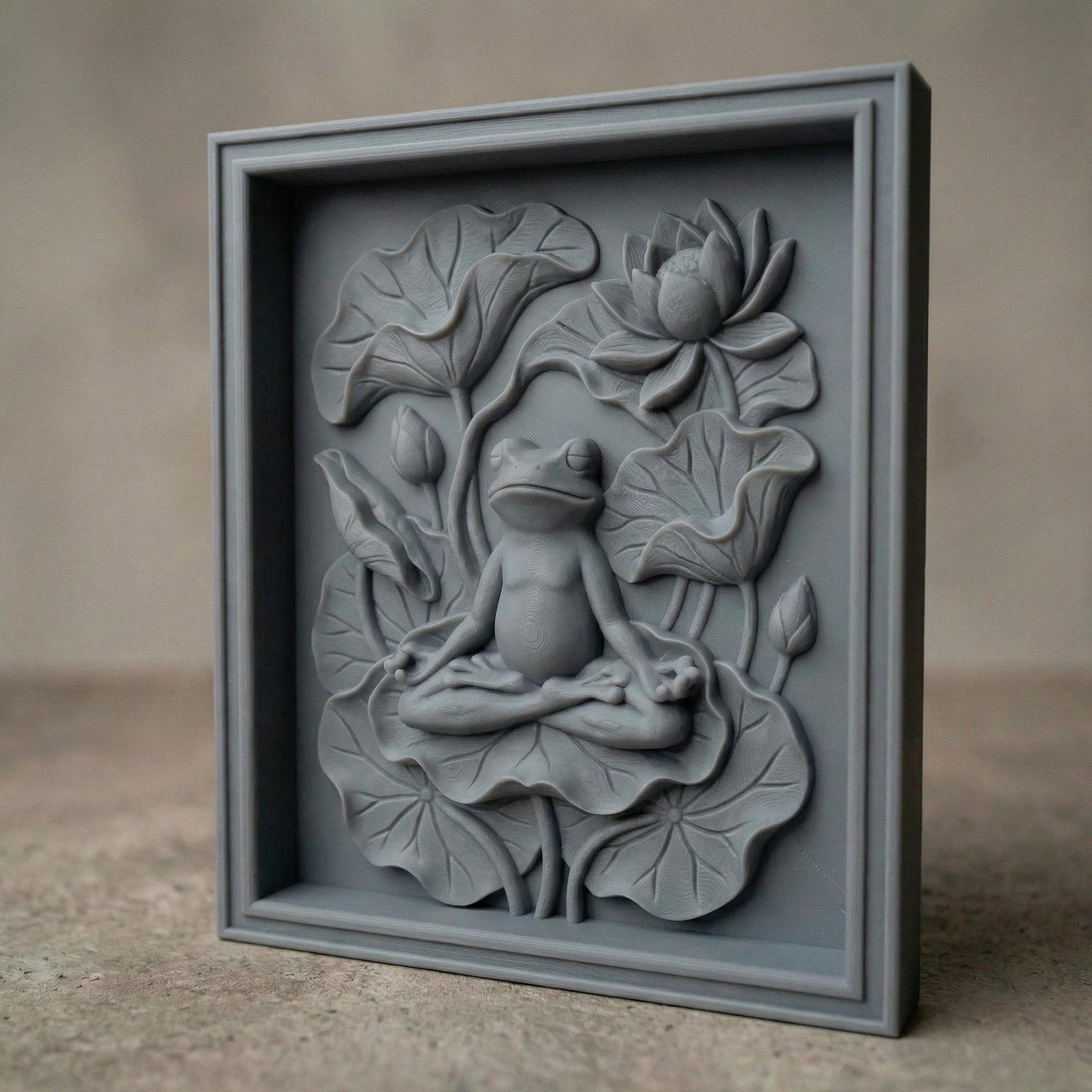 High-relief bas-relief panel featuring a peaceful frog seated in meditation pose atop layered lotus leaves, surrounded by blooming lotus flower and curved botanical stems. The composition symbolizes spring renewal, balance, and harmony in nature. Deep carved contours and textured foliage create strong dimensional shadows, ideal for CNC carving, 3D printing, and tranquil Zen-inspired seasonal wall décor.