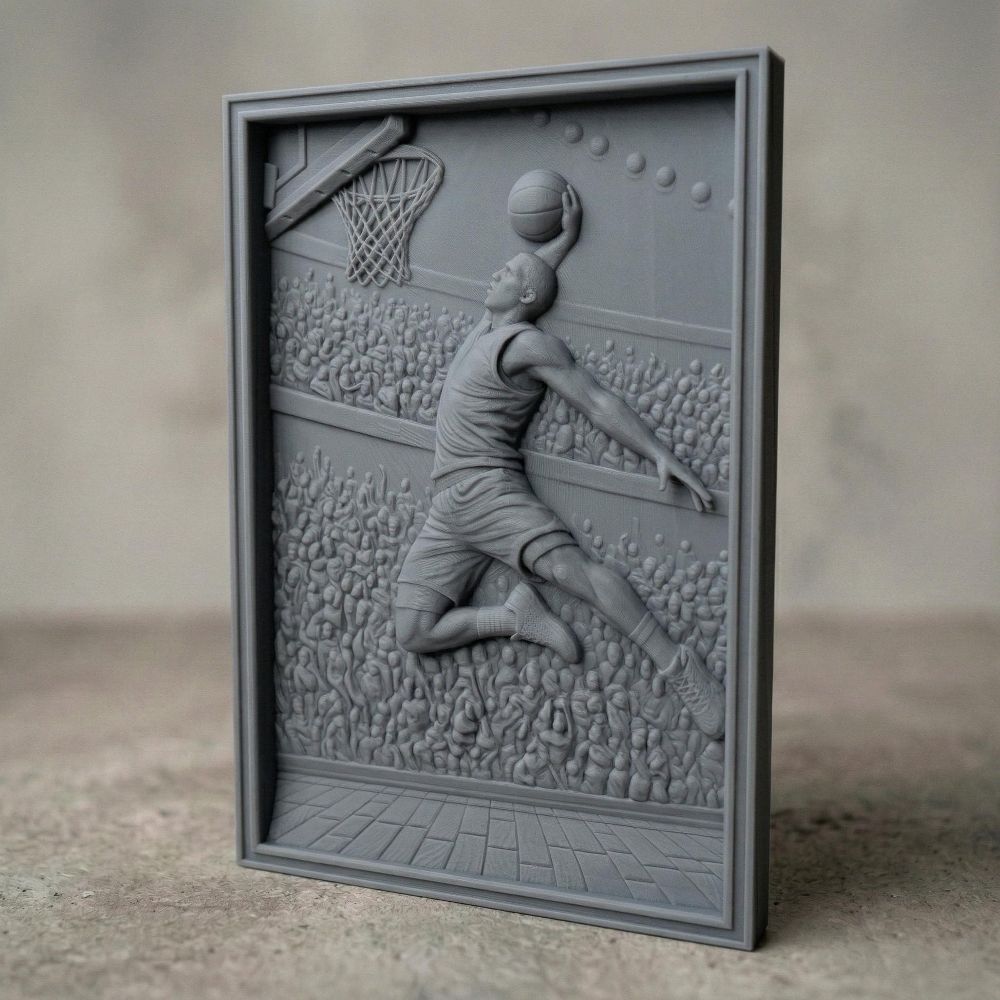 Dynamic bas-relief carving of a basketball player soaring mid-air for a powerful dunk, surrounded by a packed arena crowd, detailed court flooring, and hoop with net, capturing motion, athletic energy, and depth in a bold sports-themed composition.