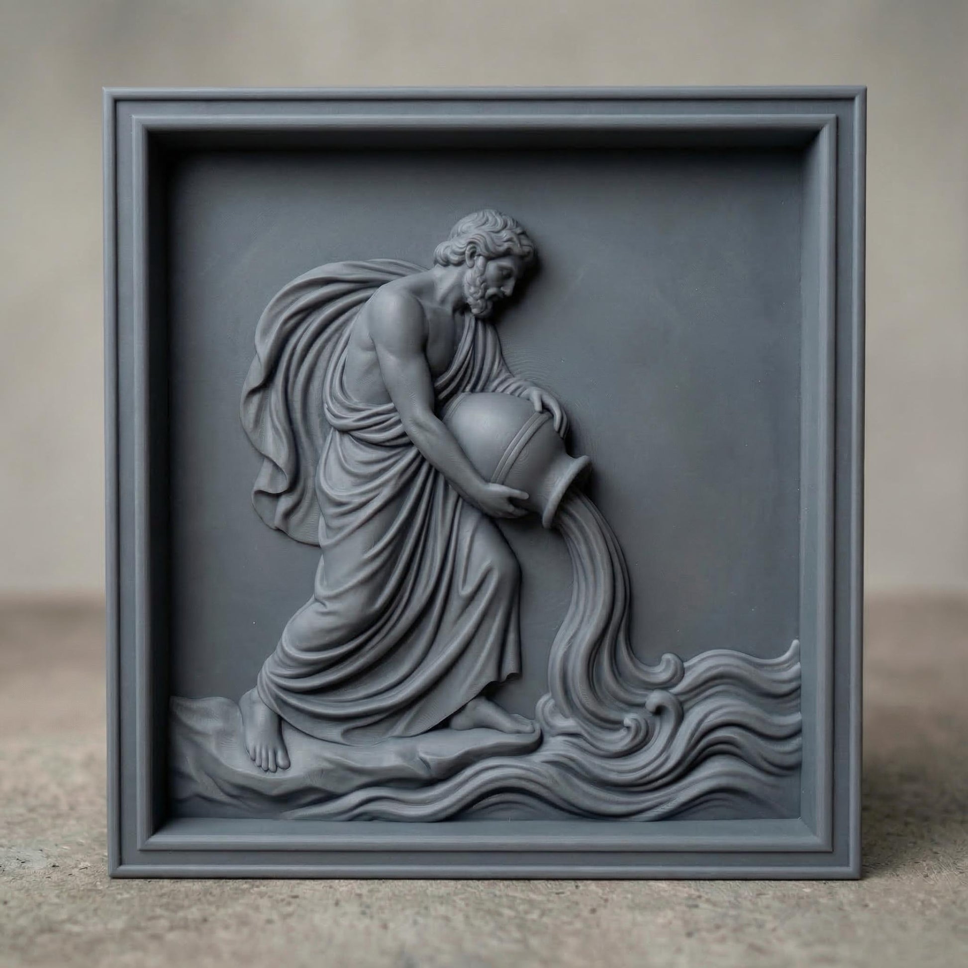 Classical bas-relief sculpture of the Aquarius water bearer carved in smooth marble style. A robed male figure with flowing drapery kneels while tilting a large amphora, pouring a stream of water that flows into stylized waves. The composition resembles ancient Greco-Roman relief art, emphasizing muscular anatomy, elegant cloth folds, and symbolic zodiac imagery associated with Aquarius and the element of water.