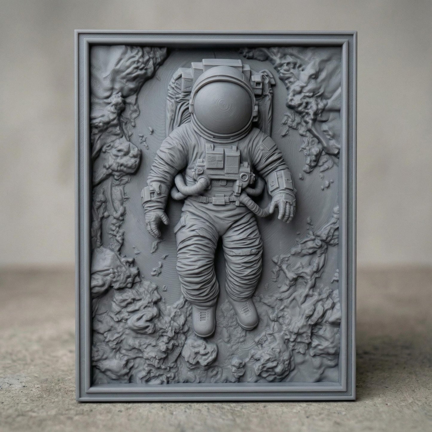 Intricate bas-relief carving of an astronaut floating weightlessly in space, surrounded by textured cosmic rock formations and abstract celestial terrain. The detailed suit, helmet, and tubing contrast with the organic, flowing background, while rich wood grain enhances depth and movement, evoking isolation, exploration, and the vast mystery of the universe.
