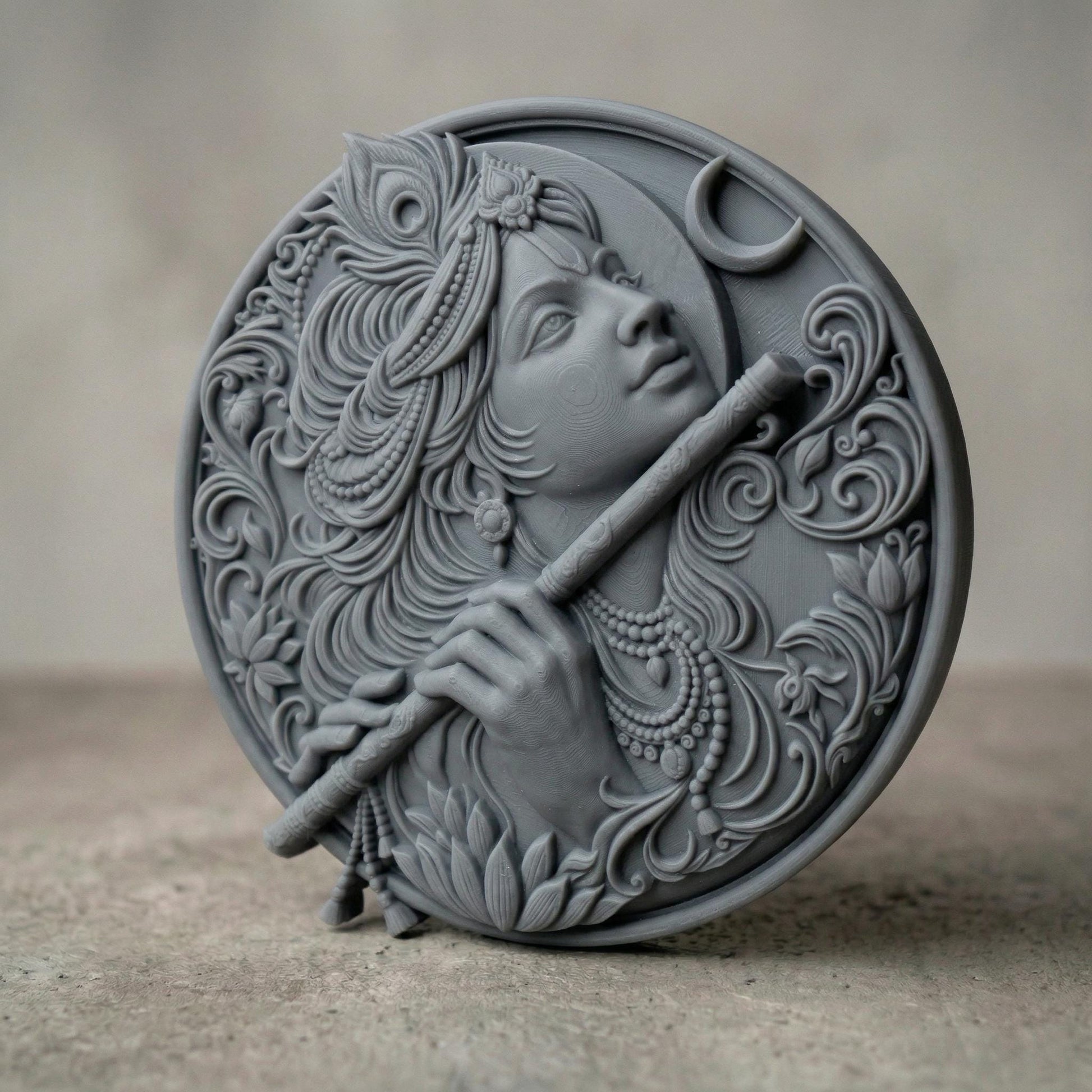 Highly detailed circular bas-relief carving of Lord Krishna playing the flute, adorned with ornate jewelry and flowing hair. A peacock feather crowns the head while a crescent moon appears in the background. Intricate floral patterns and smooth wood grain textures enhance the divine, serene expression, symbolizing peace, devotion, and spiritual harmony.