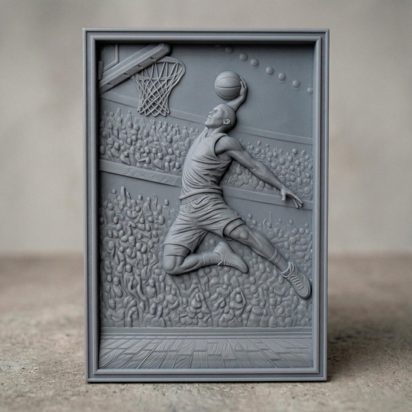 Dynamic bas-relief carving of a basketball player soaring mid-air for a powerful dunk, surrounded by a packed arena crowd, detailed court flooring, and hoop with net, capturing motion, athletic energy, and depth in a bold sports-themed composition.