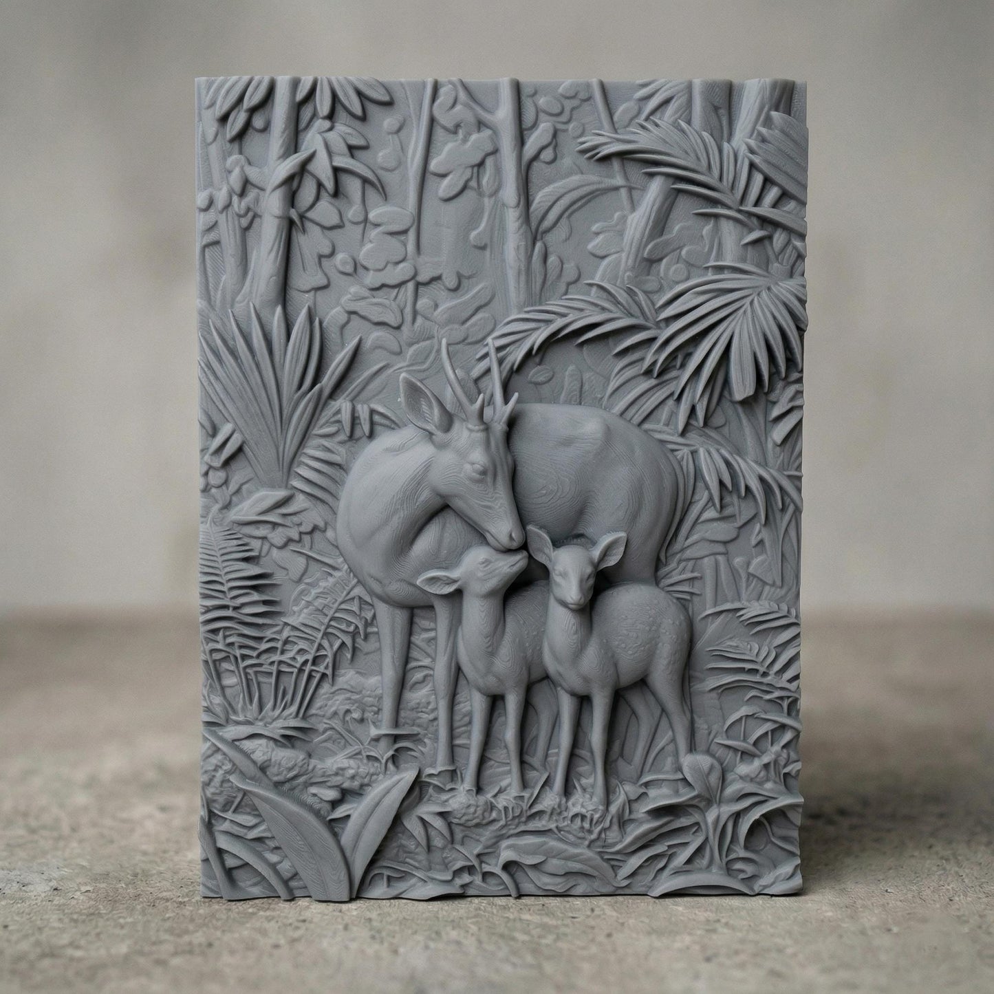 Intricate bas-relief carving of a deer family with a stag and two fawns standing closely together in a lush forest, surrounded by dense foliage, leaves, and natural woodland textures, capturing warmth, protection, and harmony in a detailed nature composition.