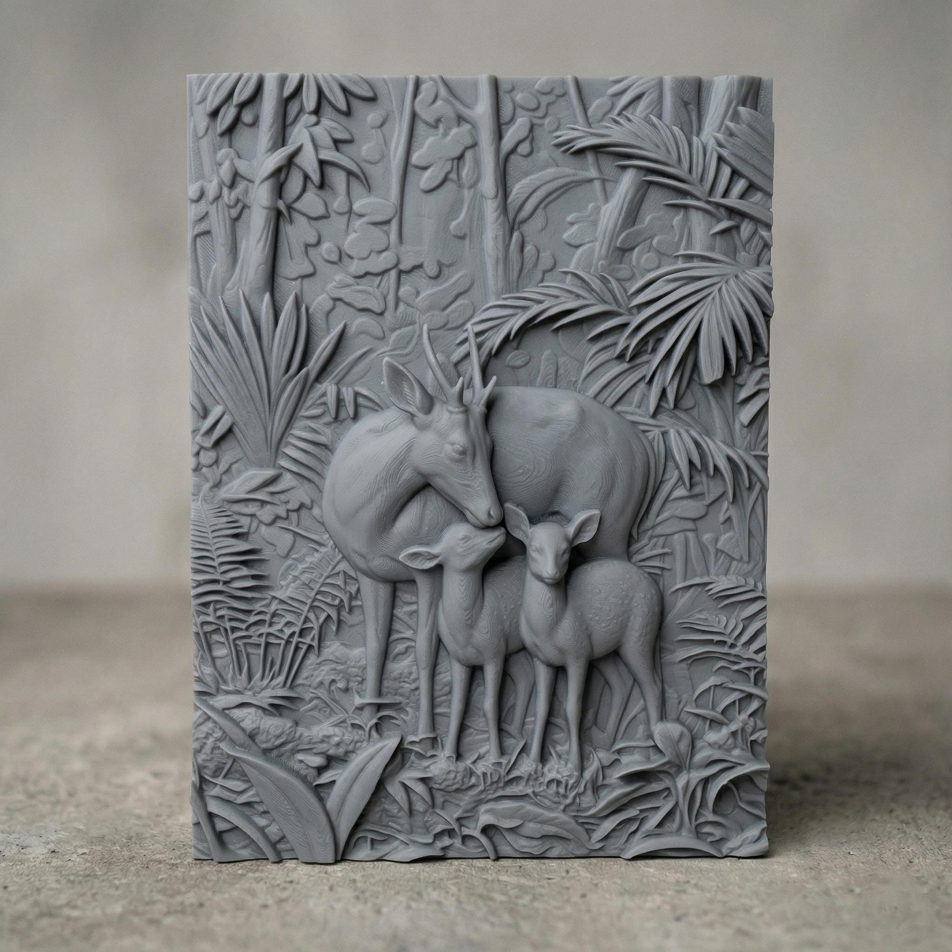 Intricate bas-relief carving of a deer family with a stag and two fawns standing closely together in a lush forest, surrounded by dense foliage, leaves, and natural woodland textures, capturing warmth, protection, and harmony in a detailed nature composition.