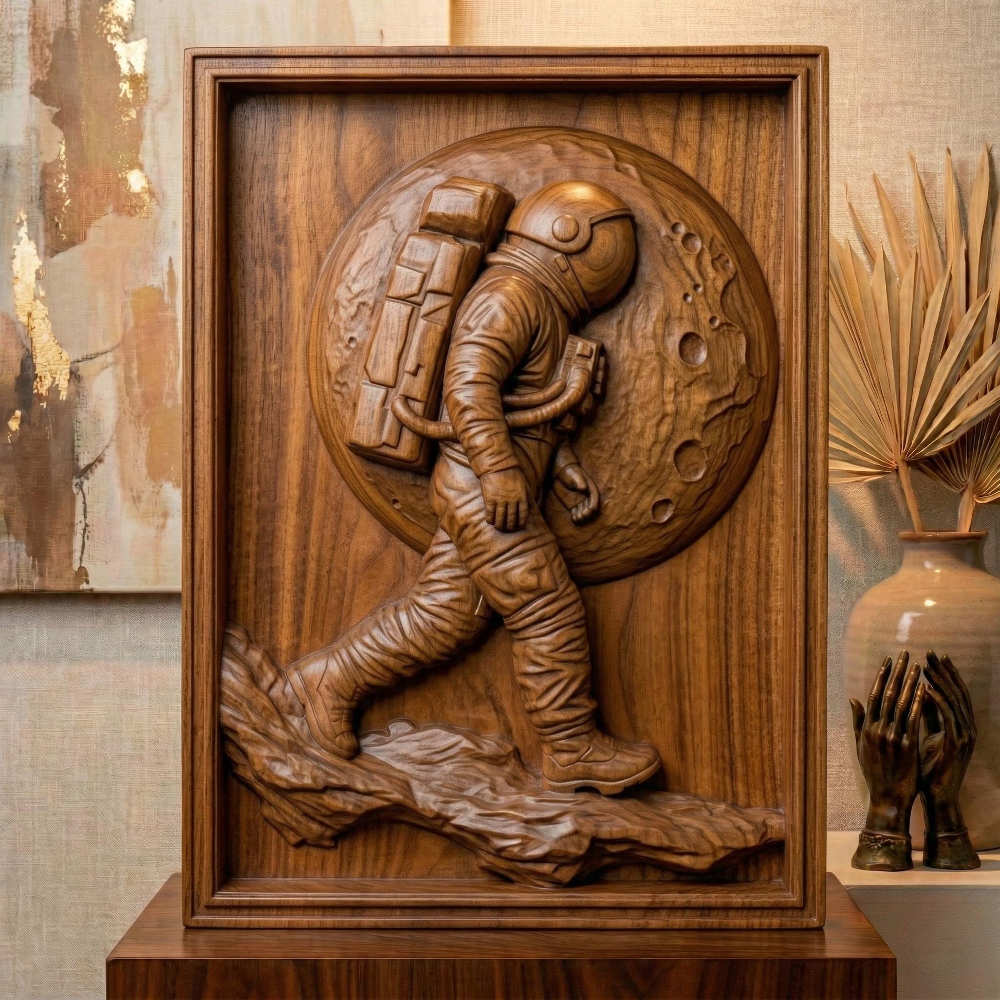 Detailed bas-relief carving of an astronaut walking across a rocky lunar surface with a large cratered moon behind. The figure wears a full space suit with backpack and helmet, captured mid-step in a futuristic exploration scene. Rich wood grain texture and depth create a bold, adventurous composition symbolizing discovery and space travel.