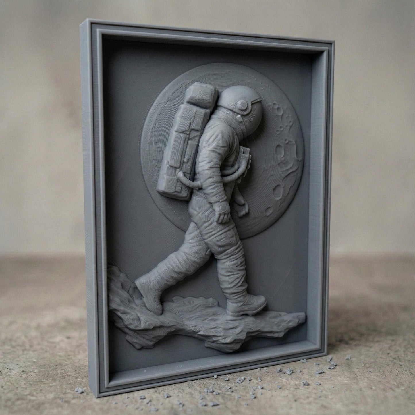Detailed bas-relief carving of an astronaut walking across a rocky lunar surface with a large cratered moon behind. The figure wears a full space suit with backpack and helmet, captured mid-step in a futuristic exploration scene. Rich wood grain texture and depth create a bold, adventurous composition symbolizing discovery and space travel.