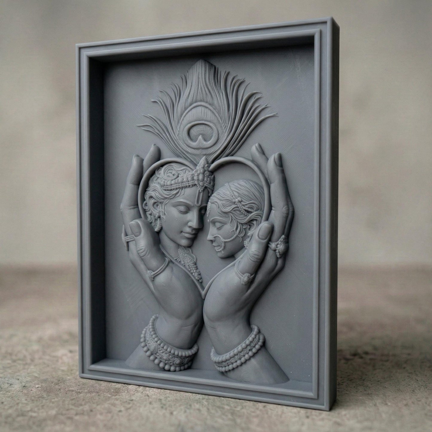 Intricately carved bas-relief of Radha and Krishna in an intimate embrace, framed by graceful hands forming a heart shape. A detailed peacock feather rises above, symbolizing divine love and harmony. Ornate jewelry, flowing hair, and smooth wood grain textures enhance the spiritual and romantic essence of this elegant composition.