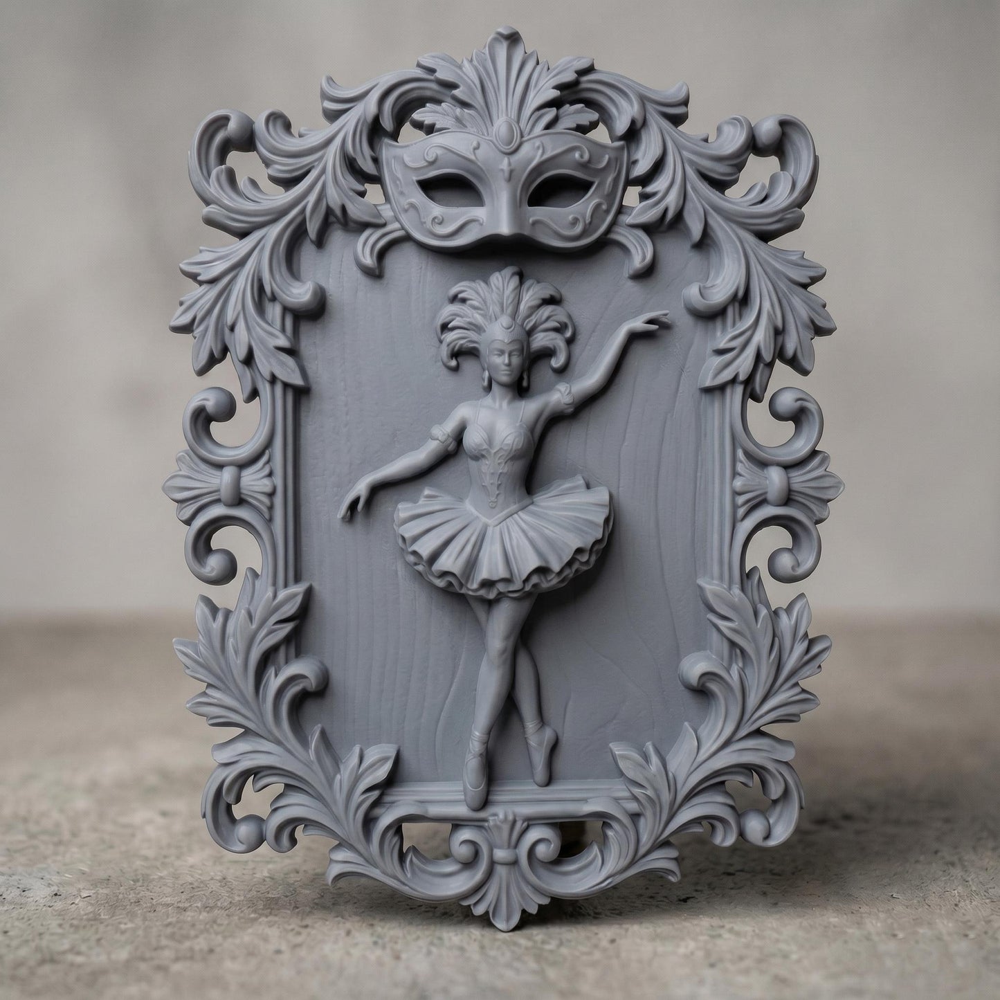 Ornate bas-relief featuring a graceful ballerina in mid-dance pose, framed by intricate baroque scrollwork and topped with a decorative Venetian carnival mask. The dancer wears a detailed tutu and feathered headpiece, symbolizing elegance and theatrical beauty, ideal for CNC carving or 3D printing refined wall decor.