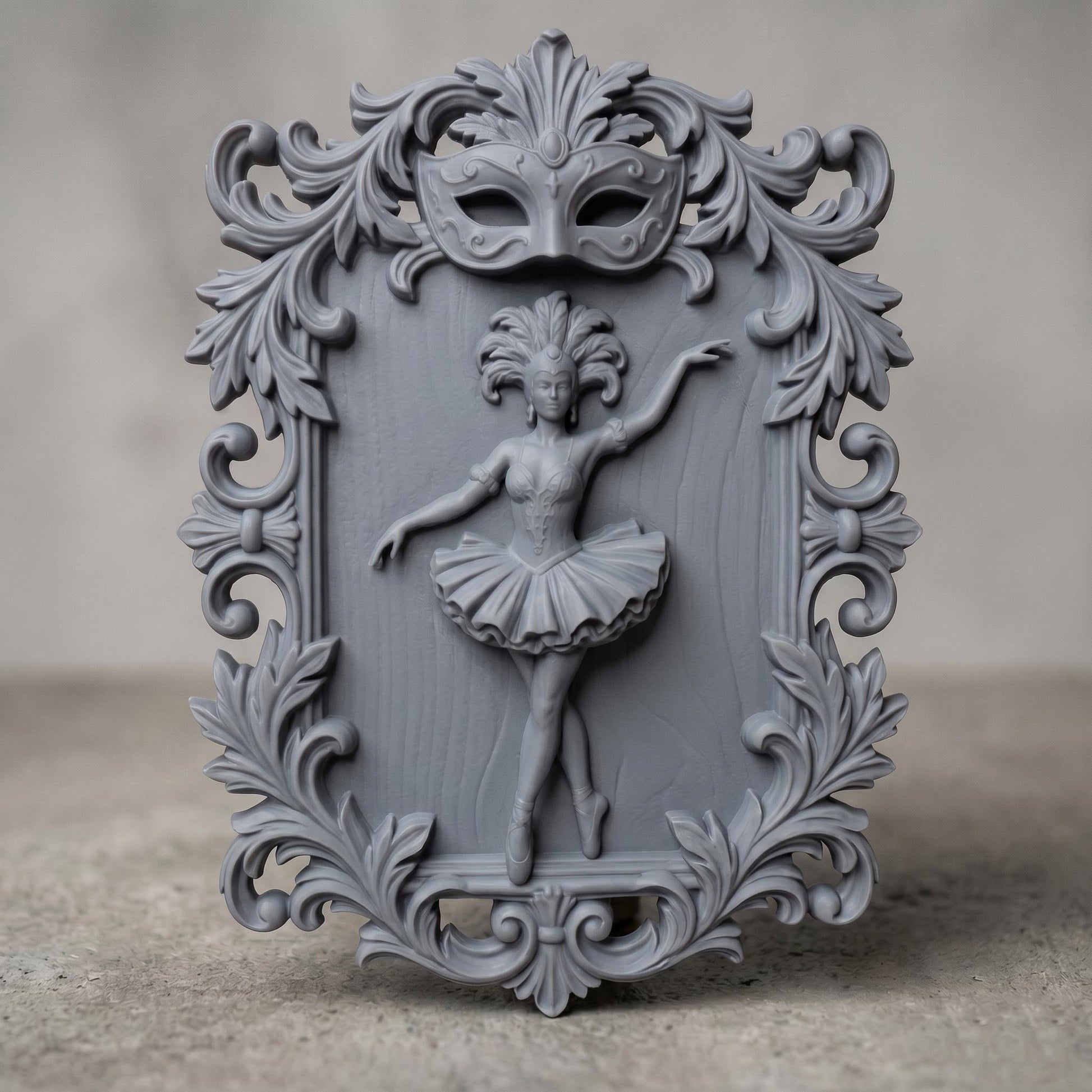Ornate bas-relief featuring a graceful ballerina in mid-dance pose, framed by intricate baroque scrollwork and topped with a decorative Venetian carnival mask. The dancer wears a detailed tutu and feathered headpiece, symbolizing elegance and theatrical beauty, ideal for CNC carving or 3D printing refined wall decor.