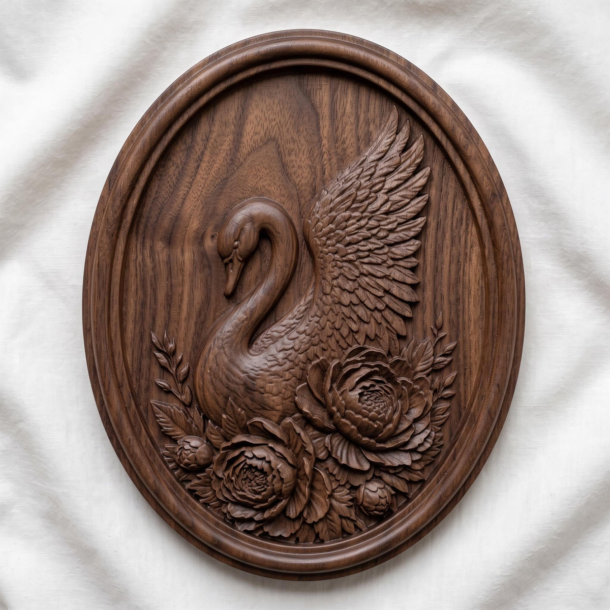 Detailed 3D bas-relief of a swan in profile with its head bowed and one wing raised and spread wide, its body encircled by large blooming peonies, buds and layered foliage. Fine feather and petal texture carved in rich walnut wood with deep shadows, set inside an oval raised molded border. Designed for CNC relief carving, wood routing, and 3D printing as swan wall decor.