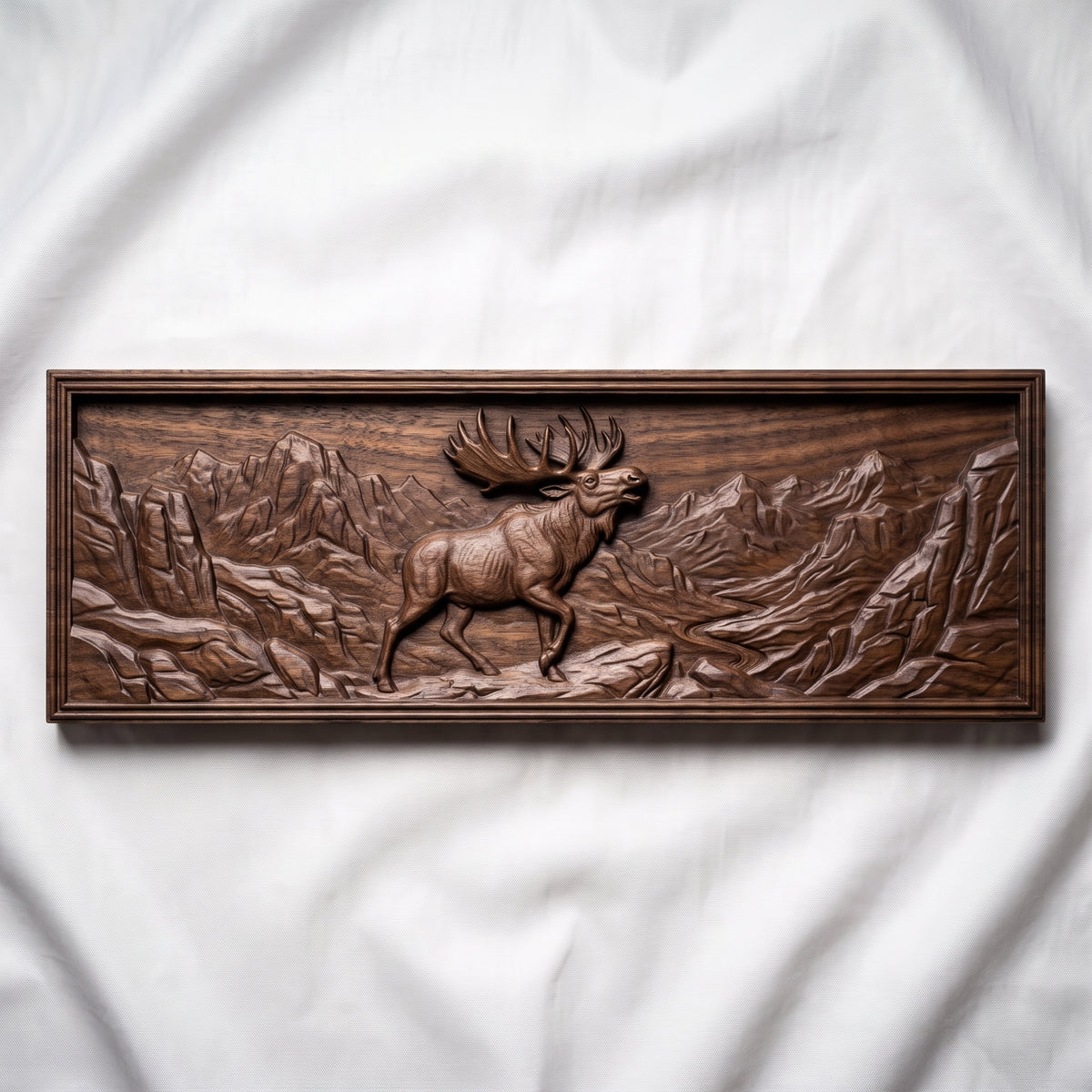 High-relief 3D bas-relief of a bugling moose with large palmate antlers standing on a rocky ledge in a rugged mountain valley with a winding river, set in a wide landscape rectangular plaque with a stepped molded border. Fine fur, rock and peak detail with layered relief. Designed for CNC relief carving, wood routing and 3D printing as rustic wildlife wall decor for a cabin, lodge or hunting den.